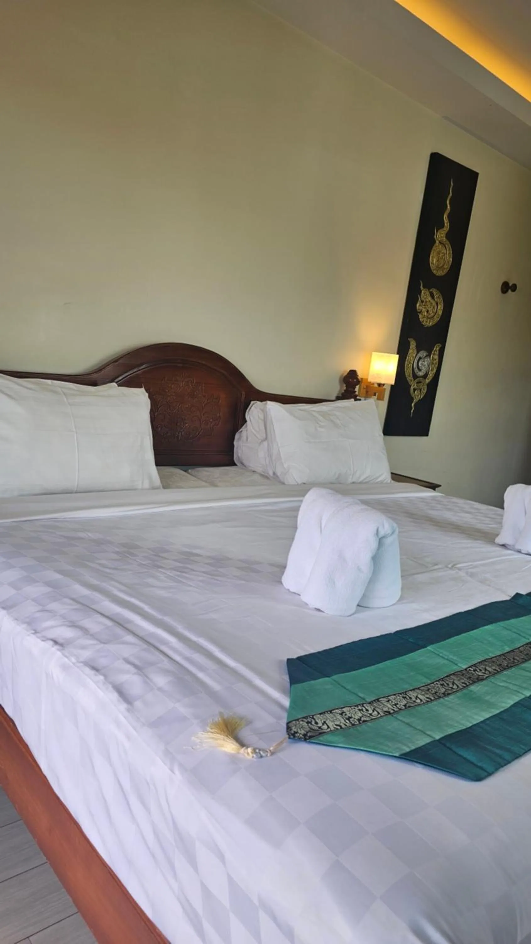 Bed in Chada Mantra Hotel