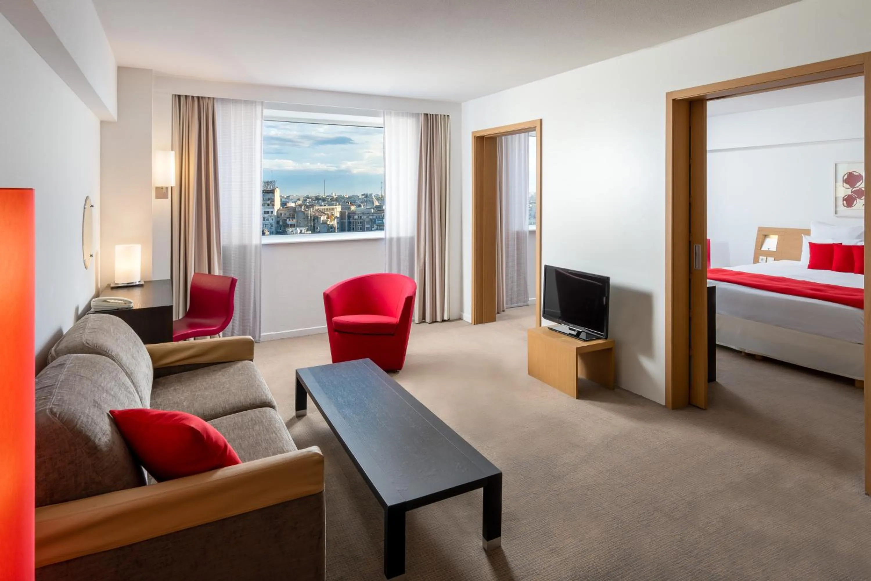 Living room, Bed in Novotel Bucharest City Centre