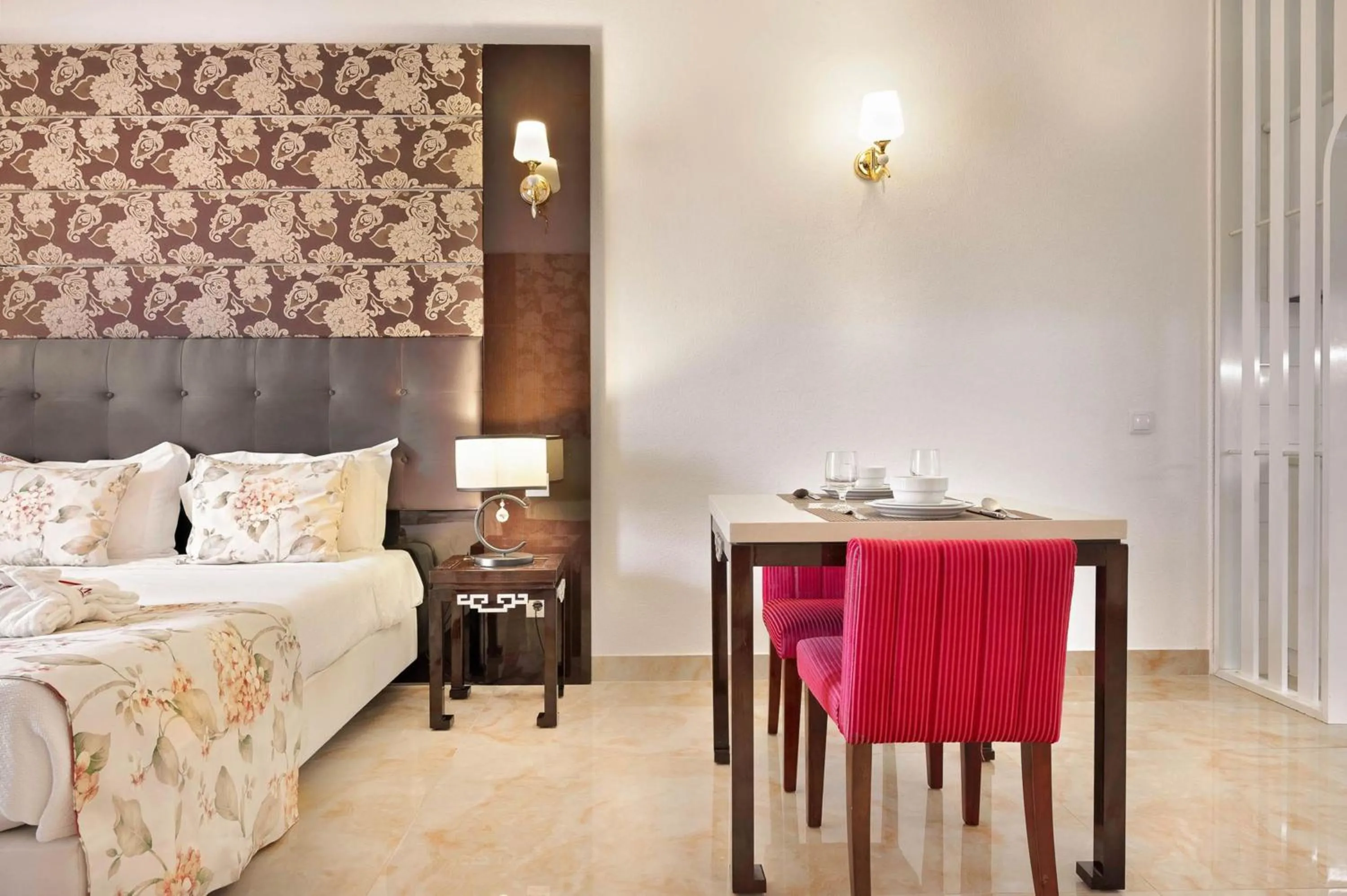 Seating area, Bed in Grand Muthu Oura View Beach Club