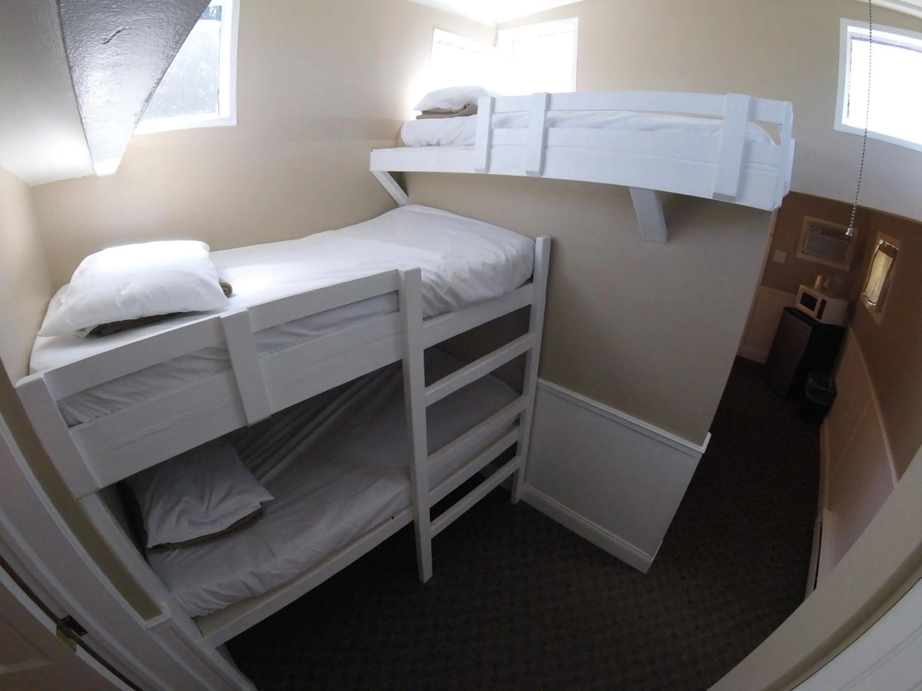 Bed in Red Caboose Motel & Restaurant