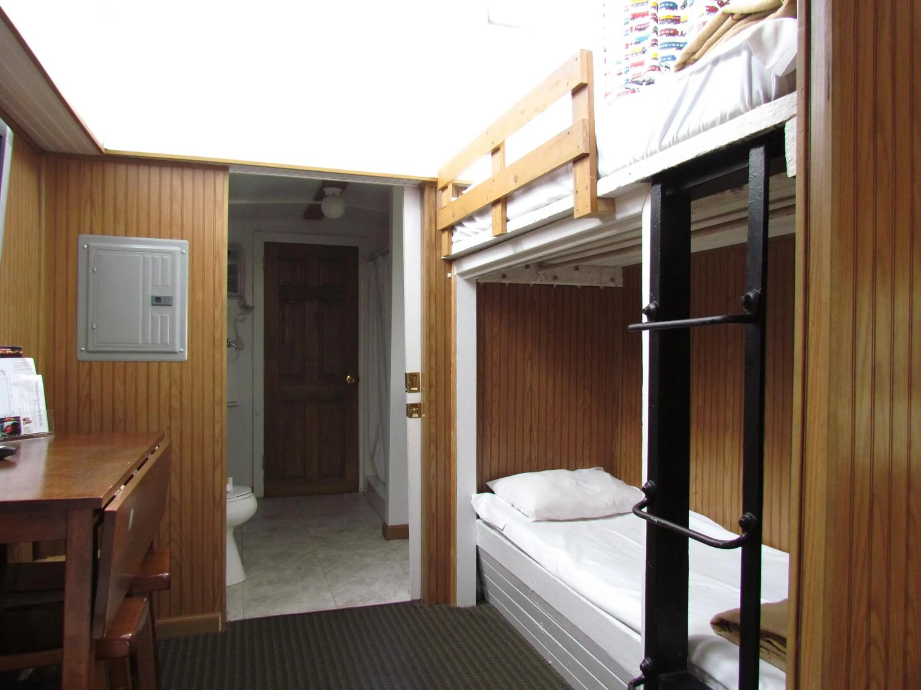 Bed in Red Caboose Motel & Restaurant