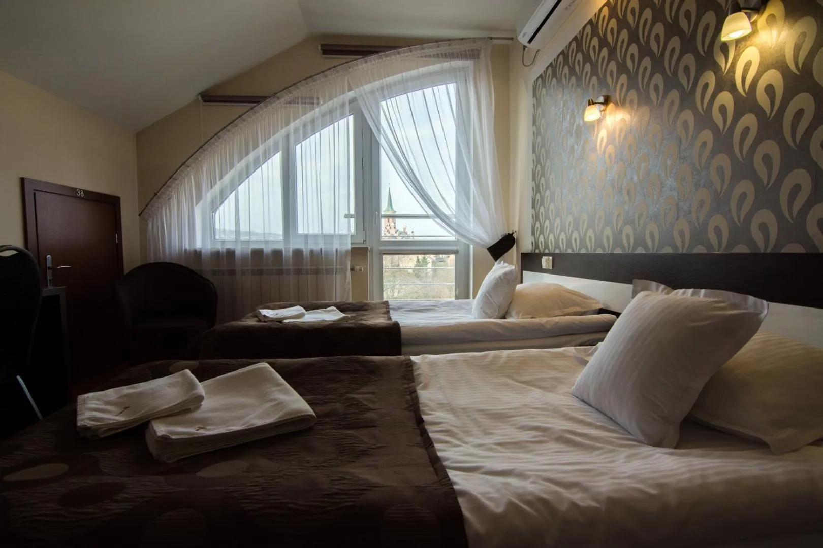 Bed in Hotel Trojka