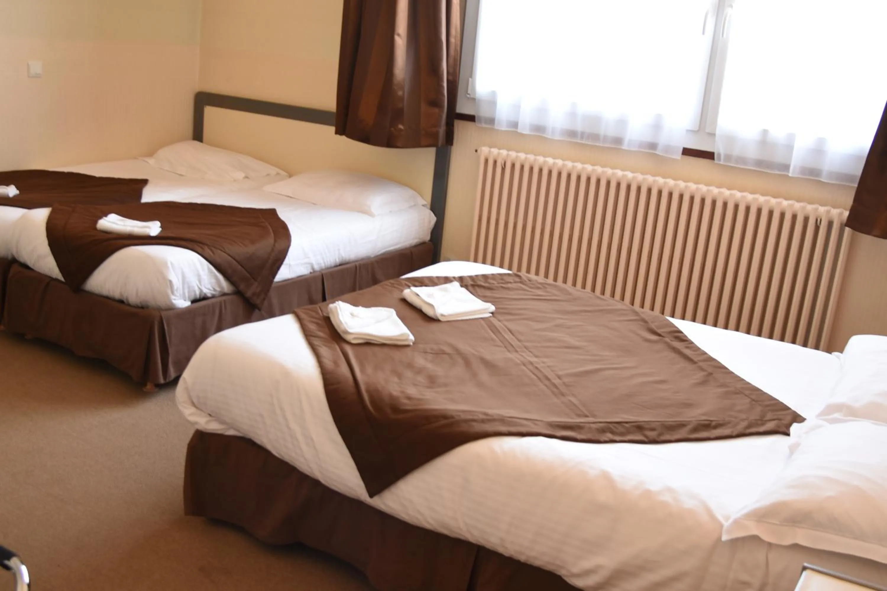 Day, Bed in Hôtel Continental