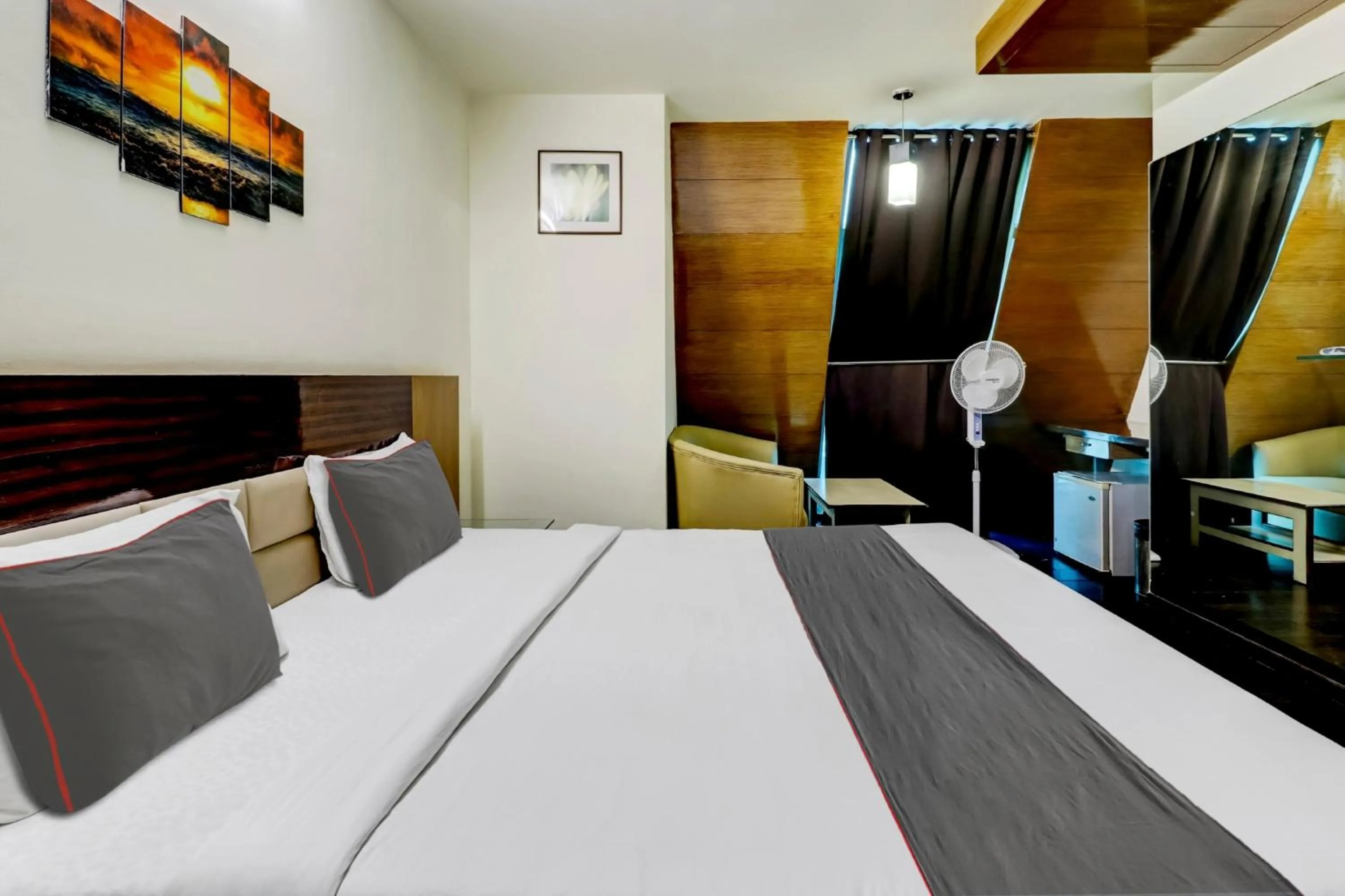 Bathroom, Bed in Collection O Madhura Residency