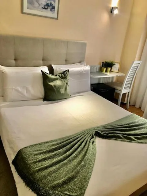 Bed in Hotel Excelsior