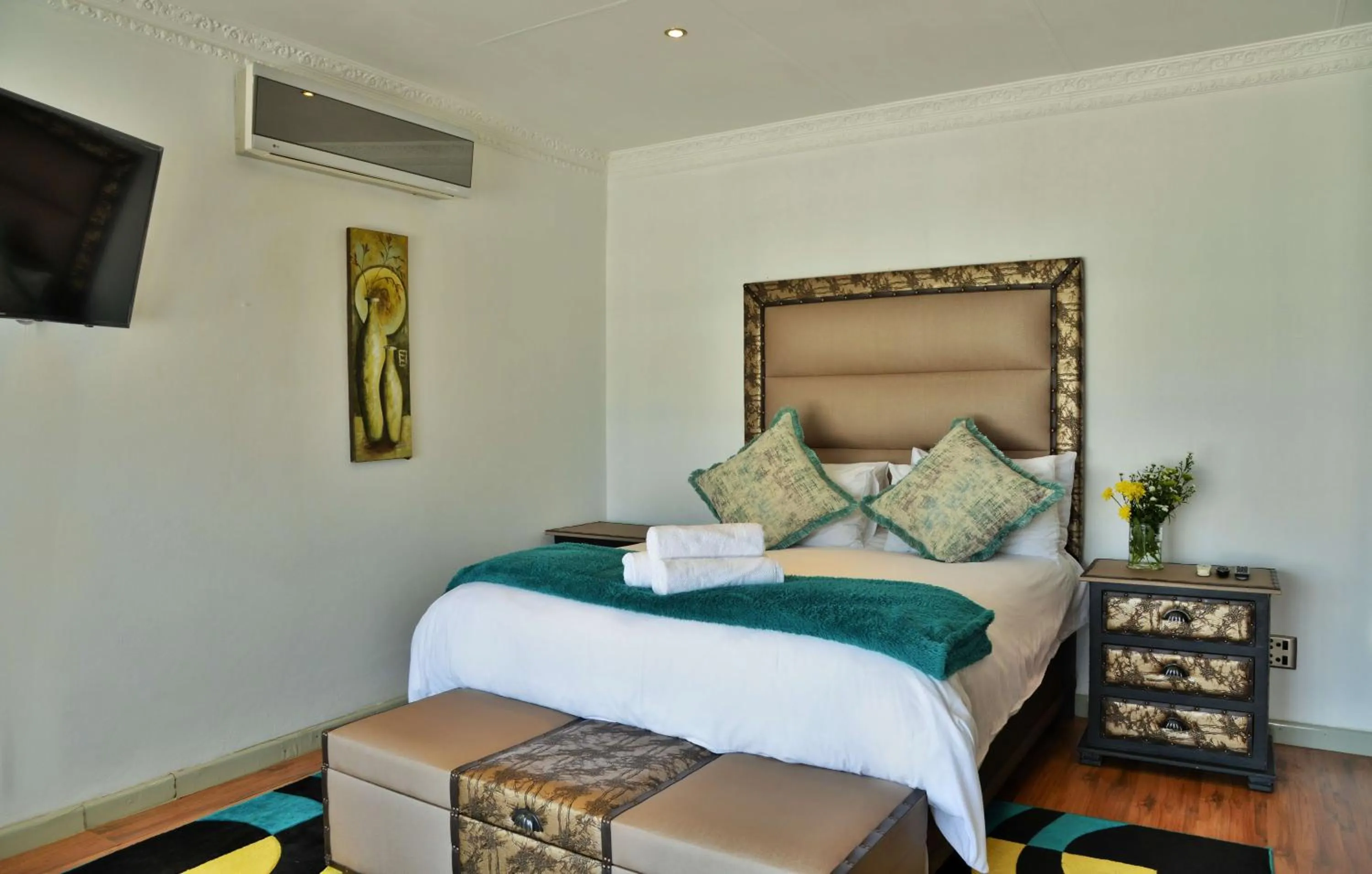 Bed in Indlovukazi Guesthouse