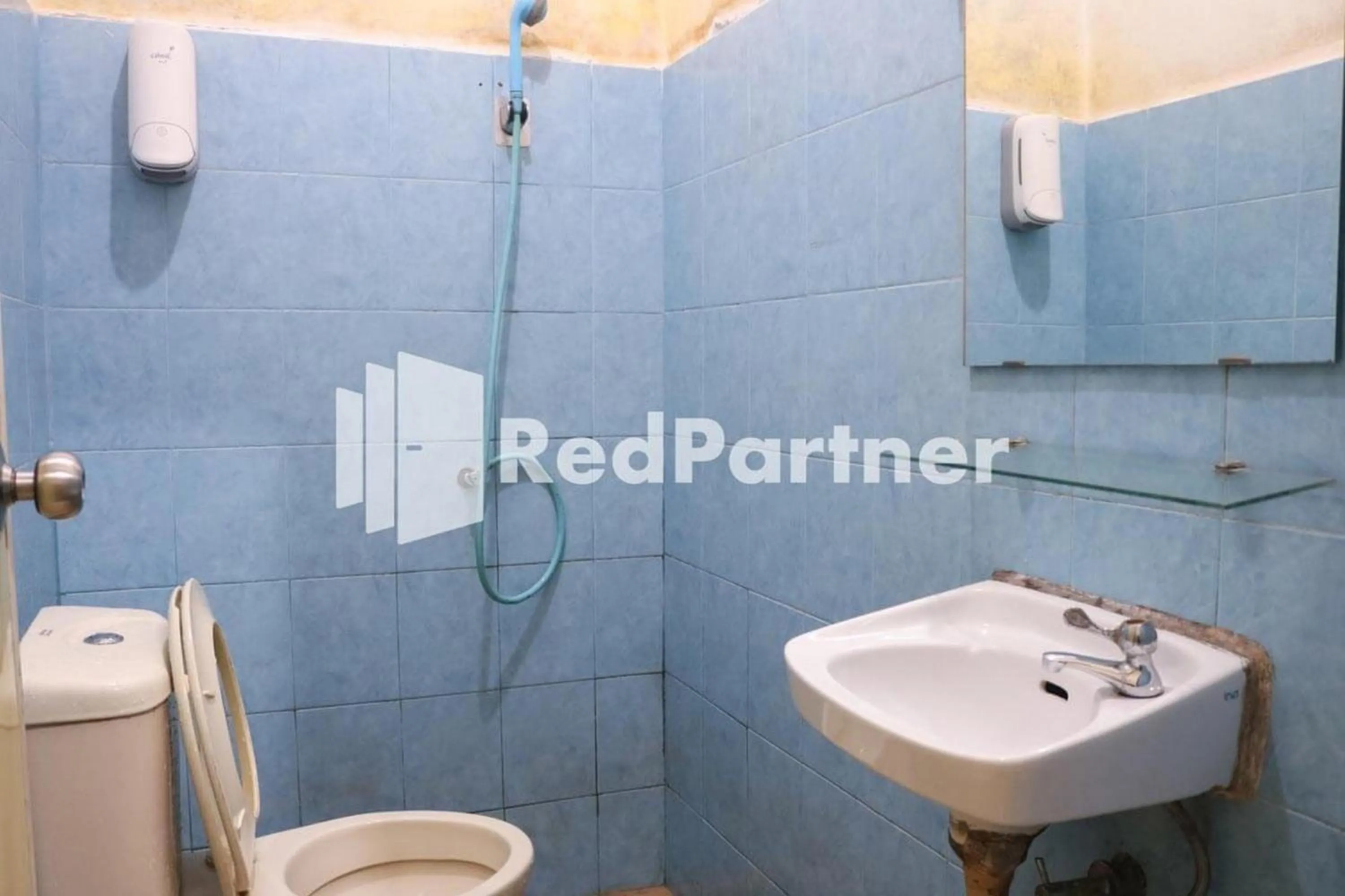 Bathroom in Good Sleep Balikpapan Mitra RedDoorz