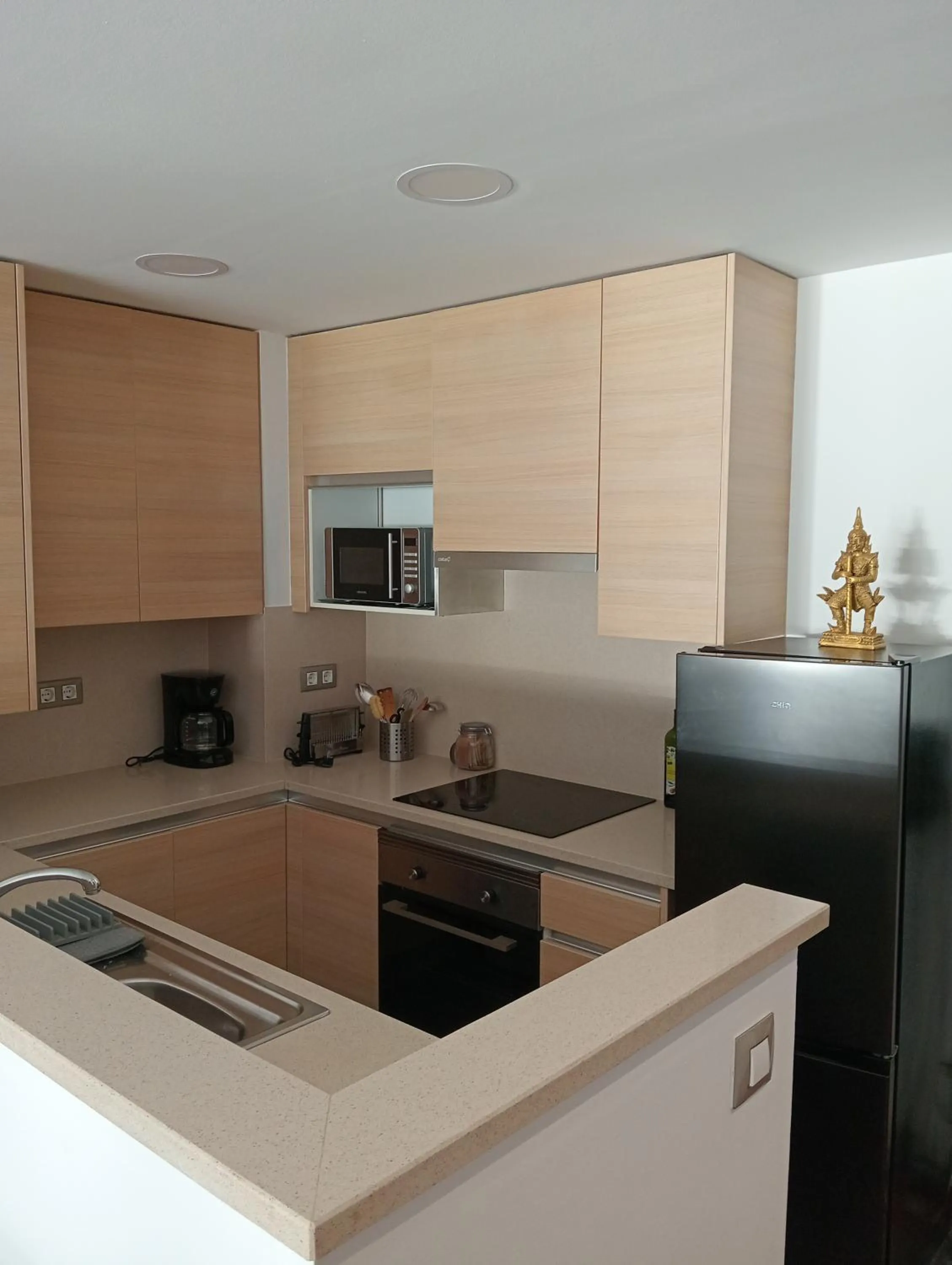 Kitchen or kitchenette in Palamós Apartamentos