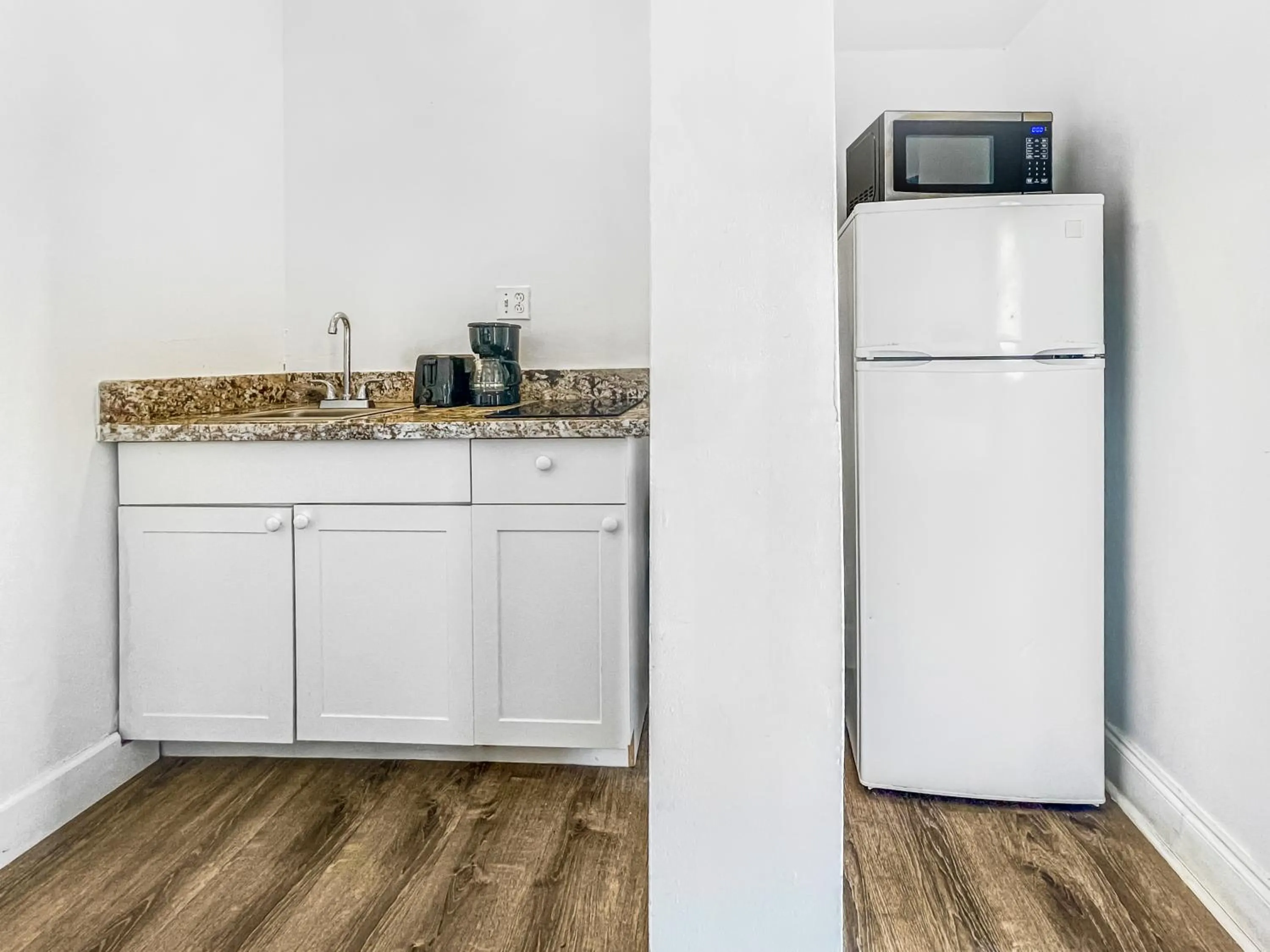 kitchen in Paradise Oceanfront by HBH