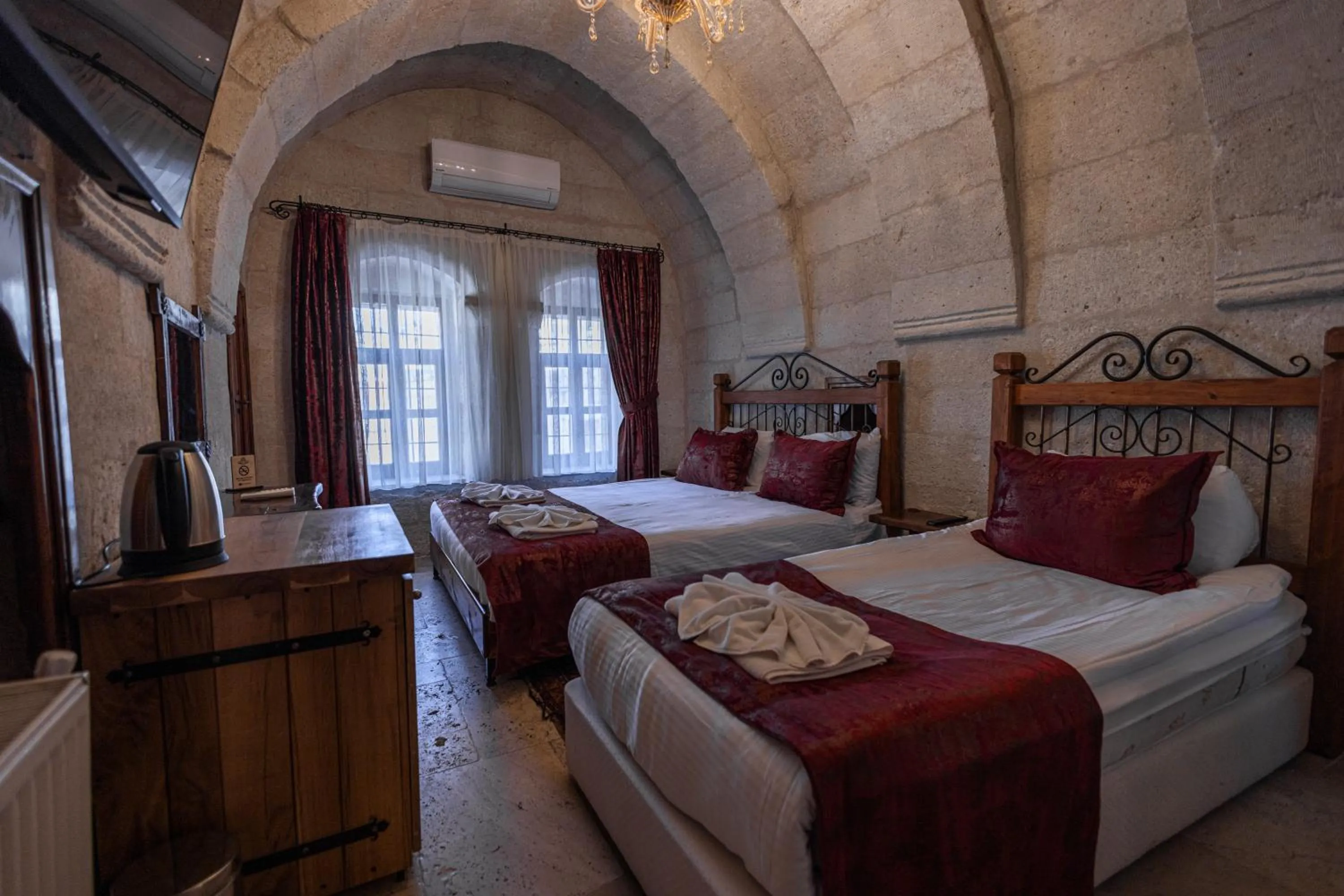 Bed in Göreme Cave Suites