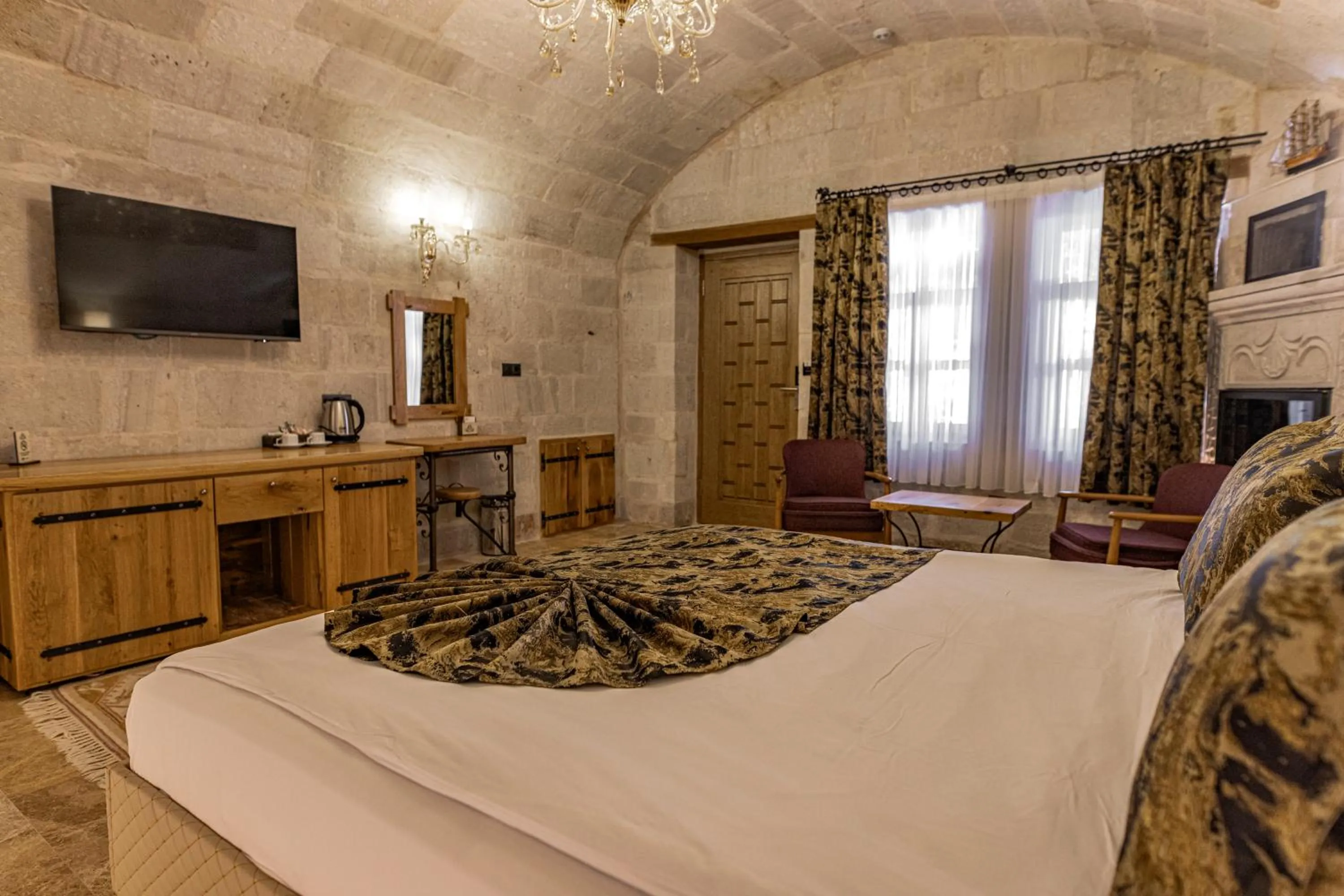 Bed in Göreme Cave Suites