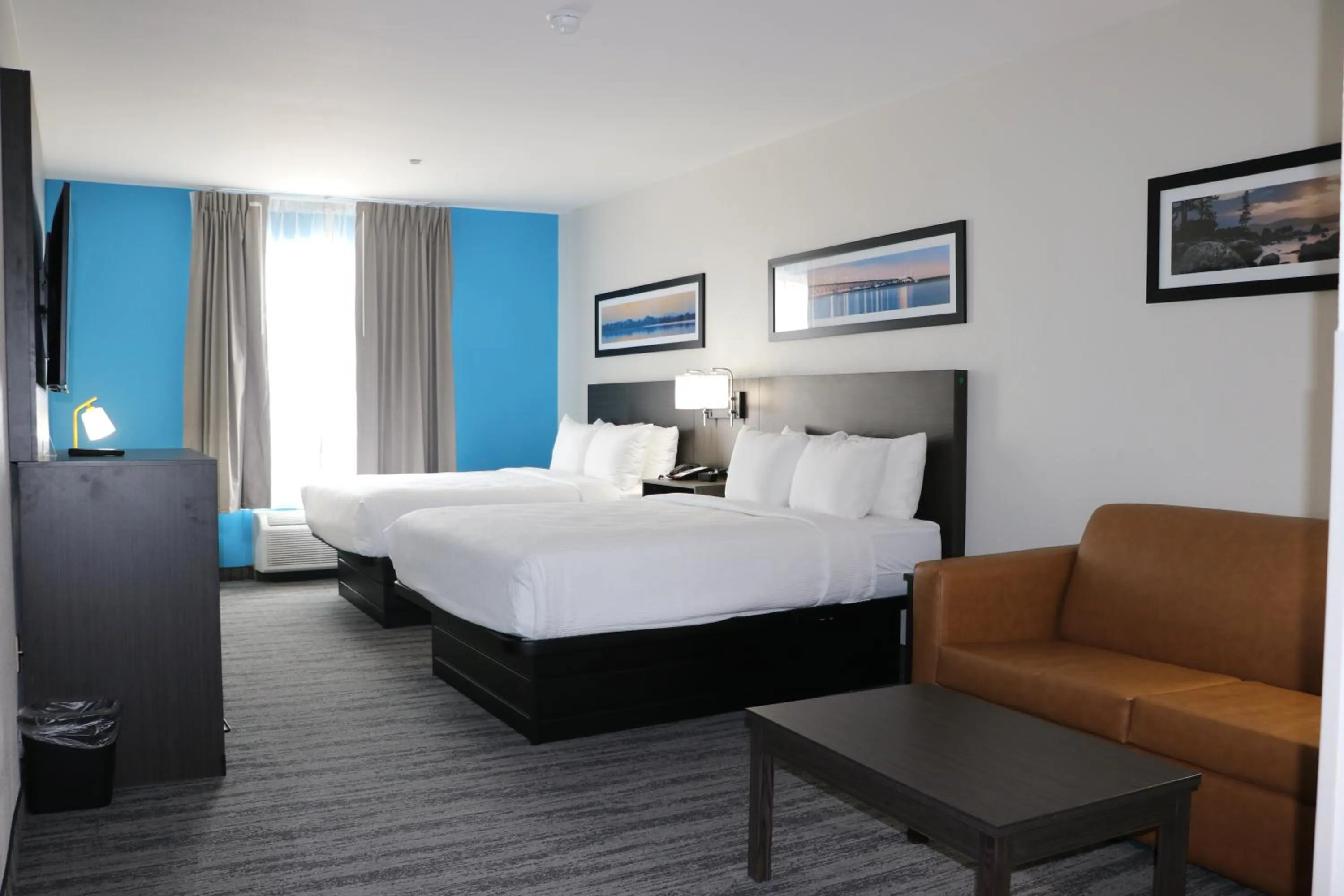 Bed in Quality Inn & Suites