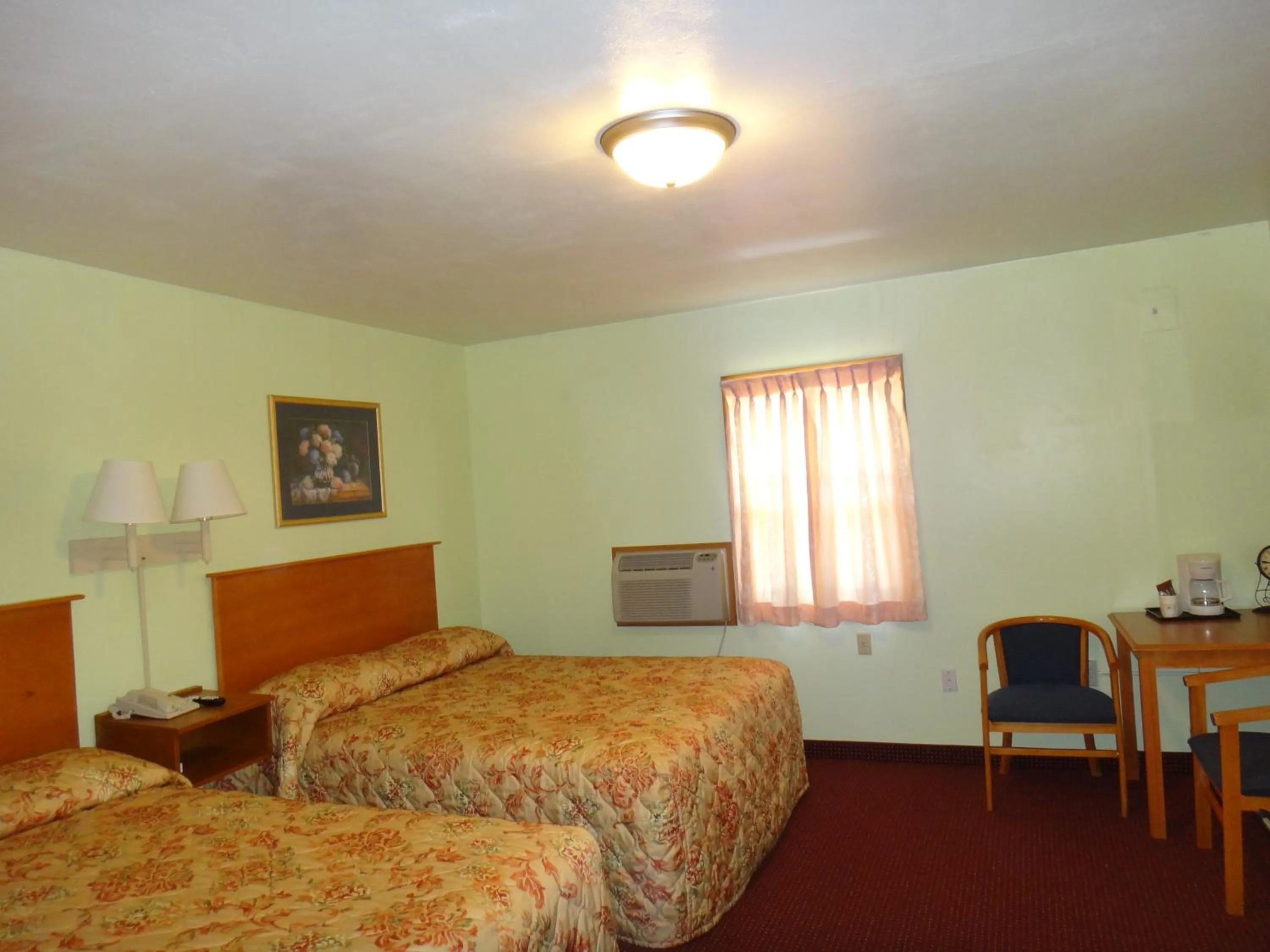 Bed in Pine Ridge Motel