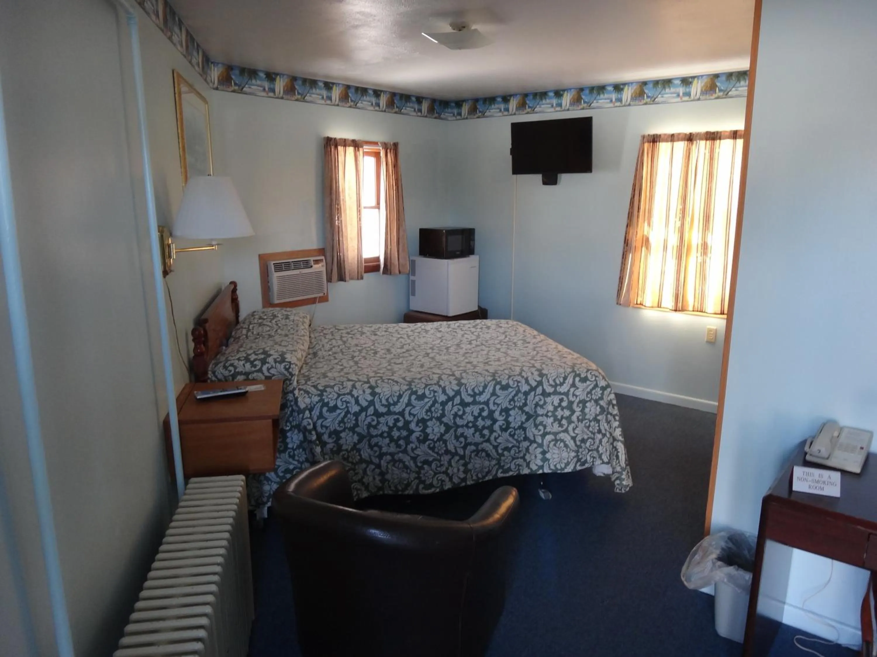 Bed in Pine Ridge Motel