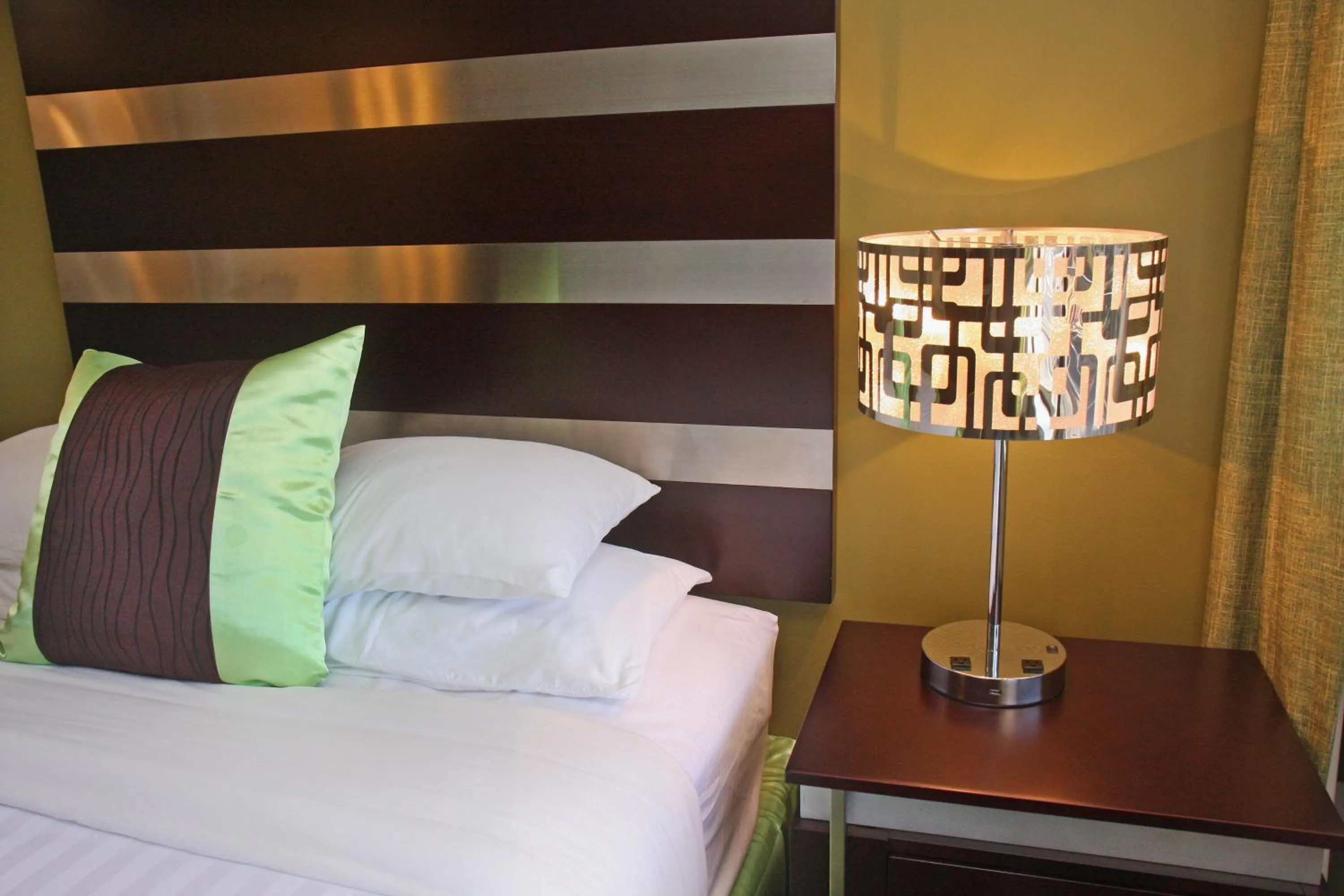 Decorative detail, Bed in Gateway Inn and Suites