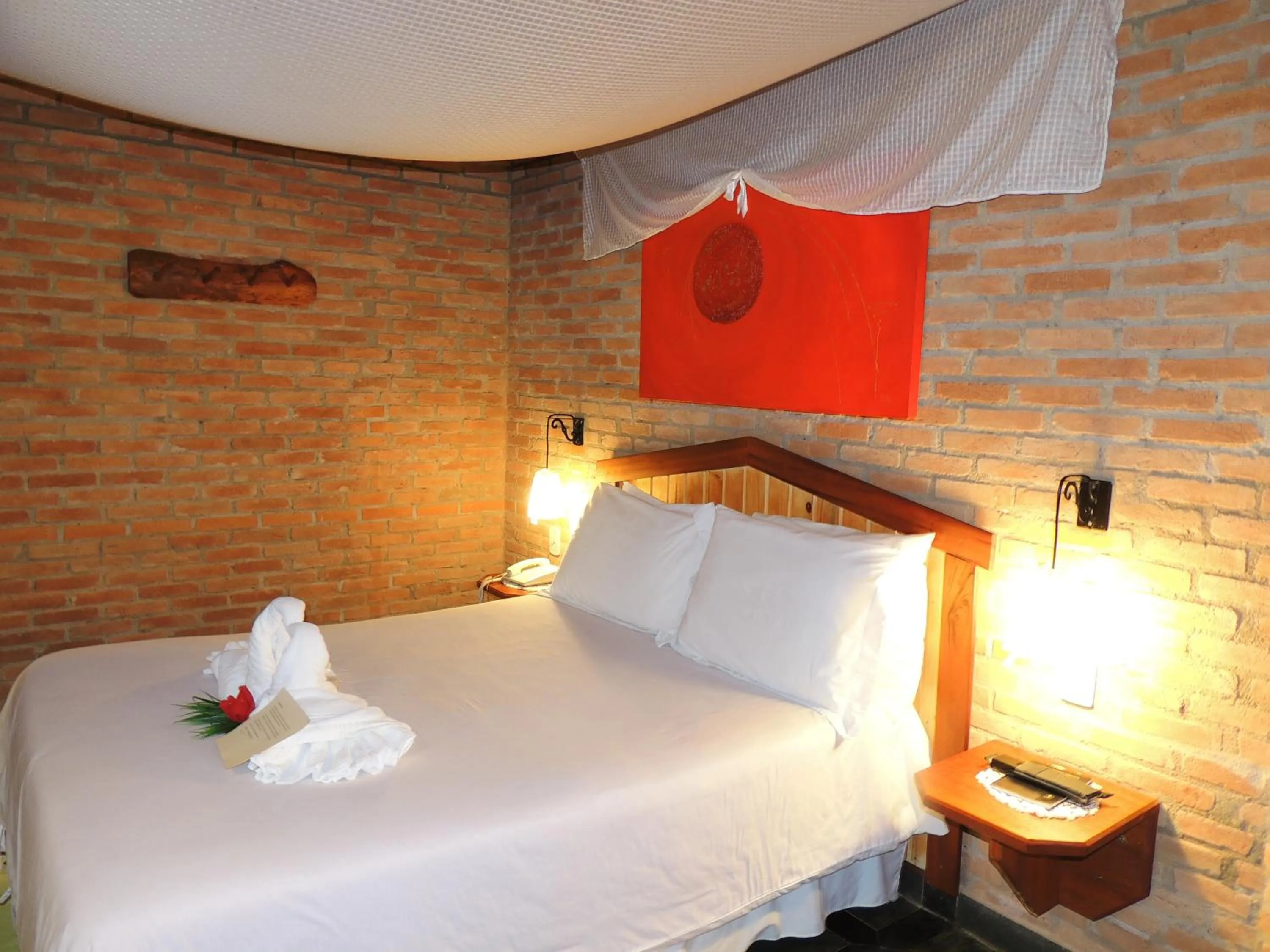 Bed in Pousada Cantinho das Estrelas