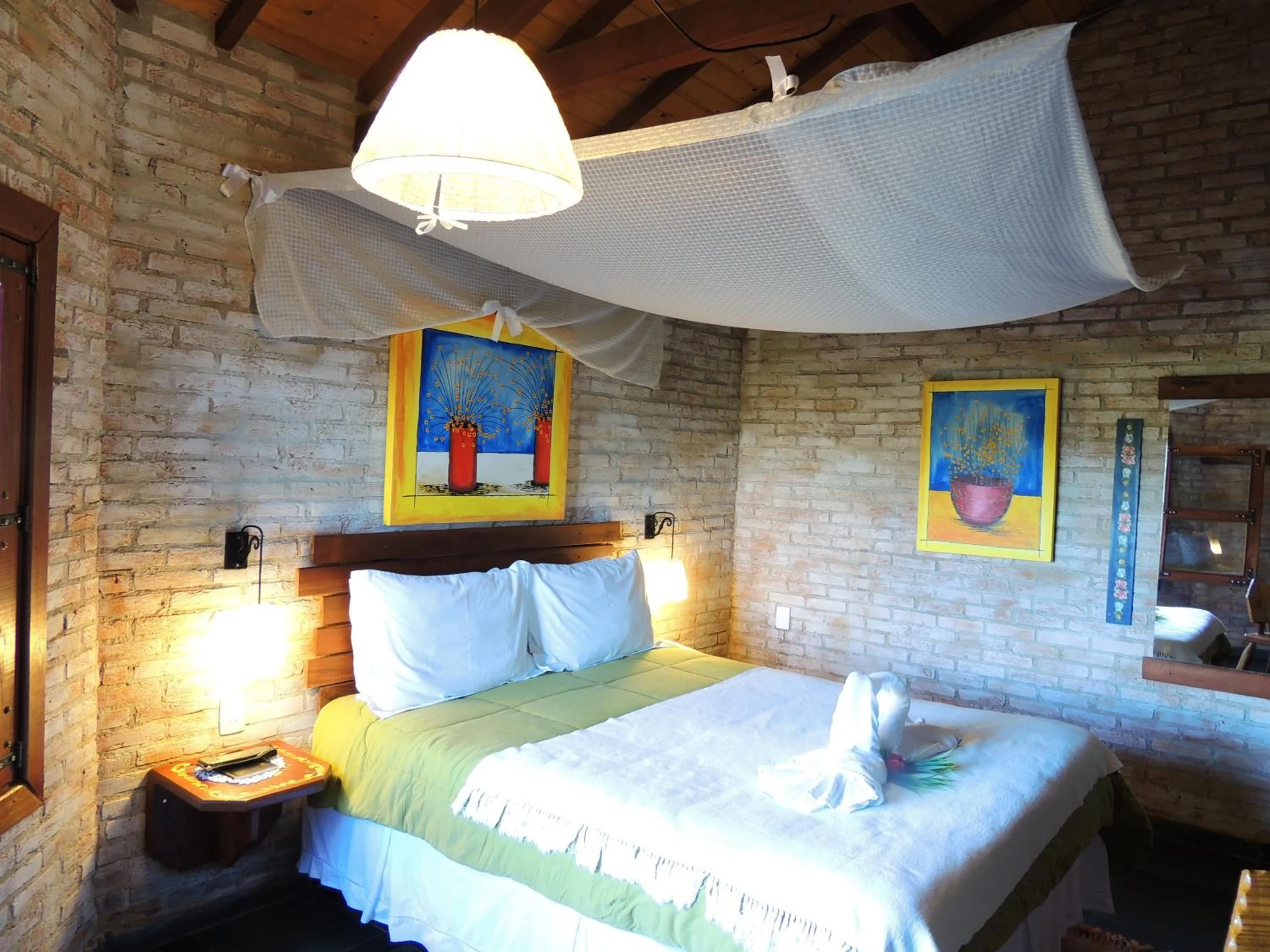 Bed in Pousada Cantinho das Estrelas