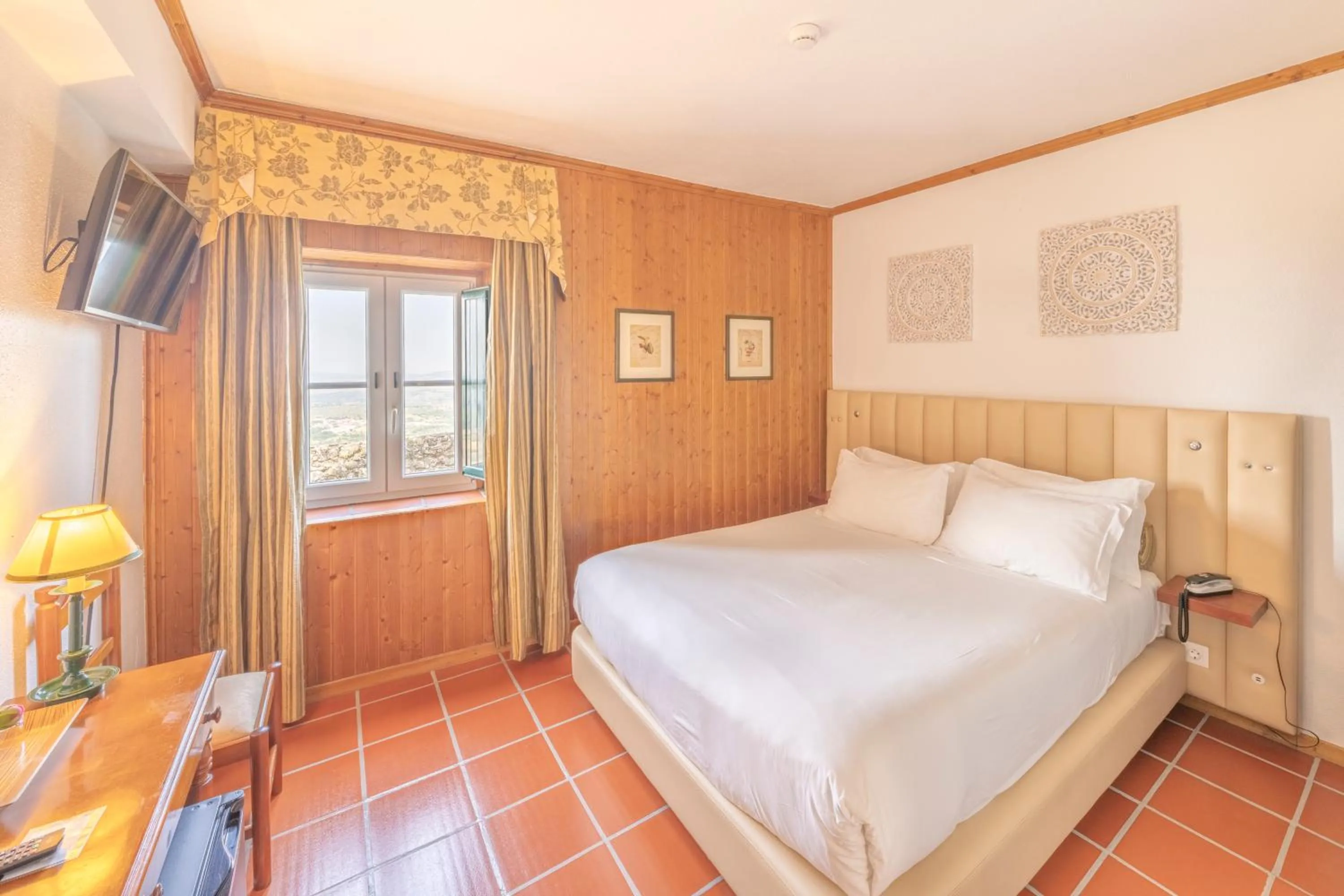 Bed in Hotel El Rei Dom Manuel