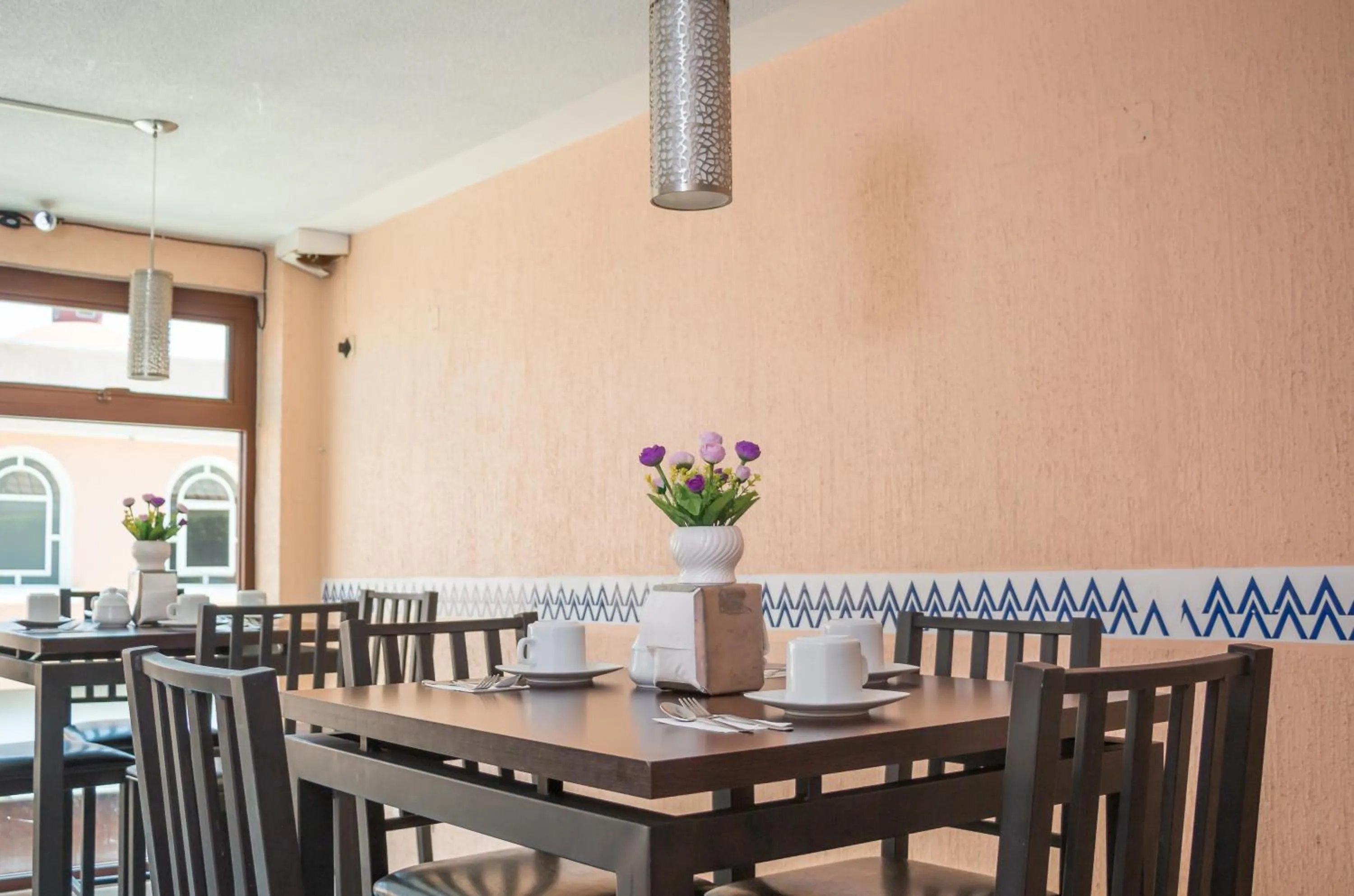 Dining area in Hotel Express Alejandría