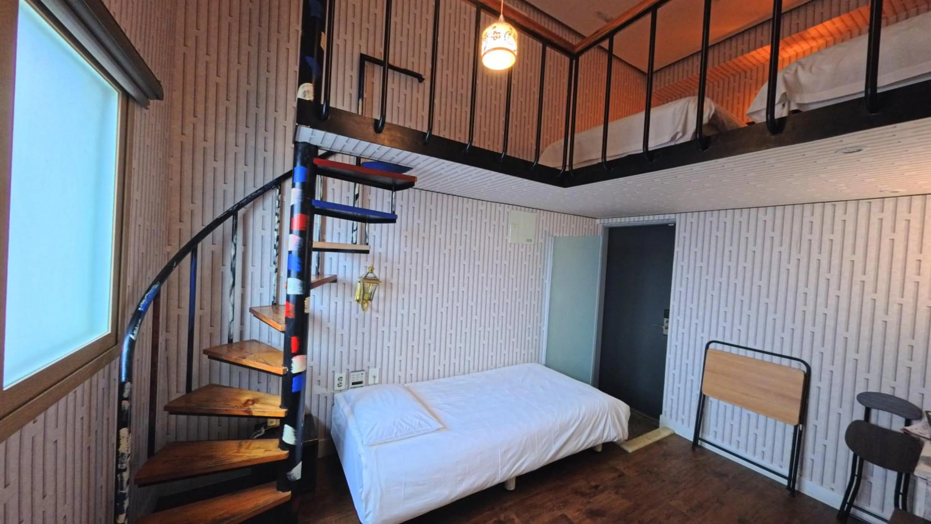 Bed in Friendly DH Naissance Hotel by Mindrum Group