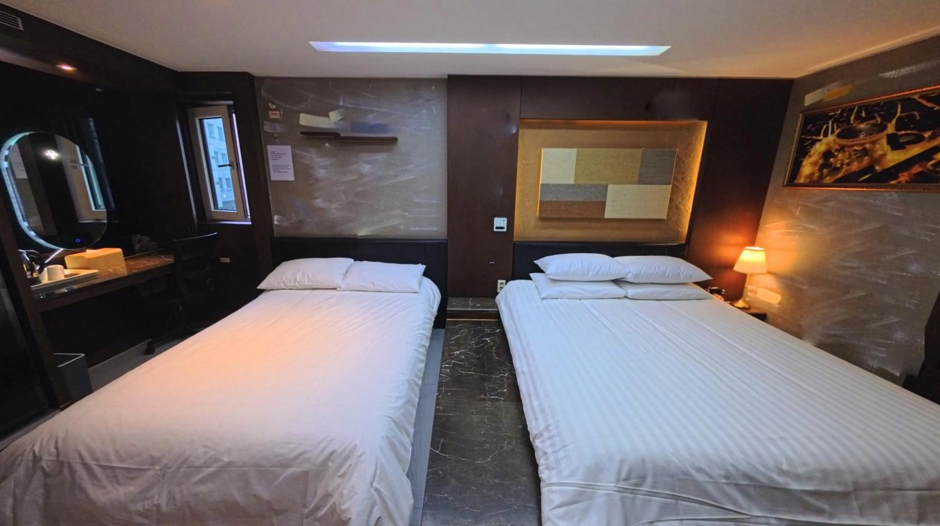 Bed in Friendly DH Naissance Hotel by Mindrum Group