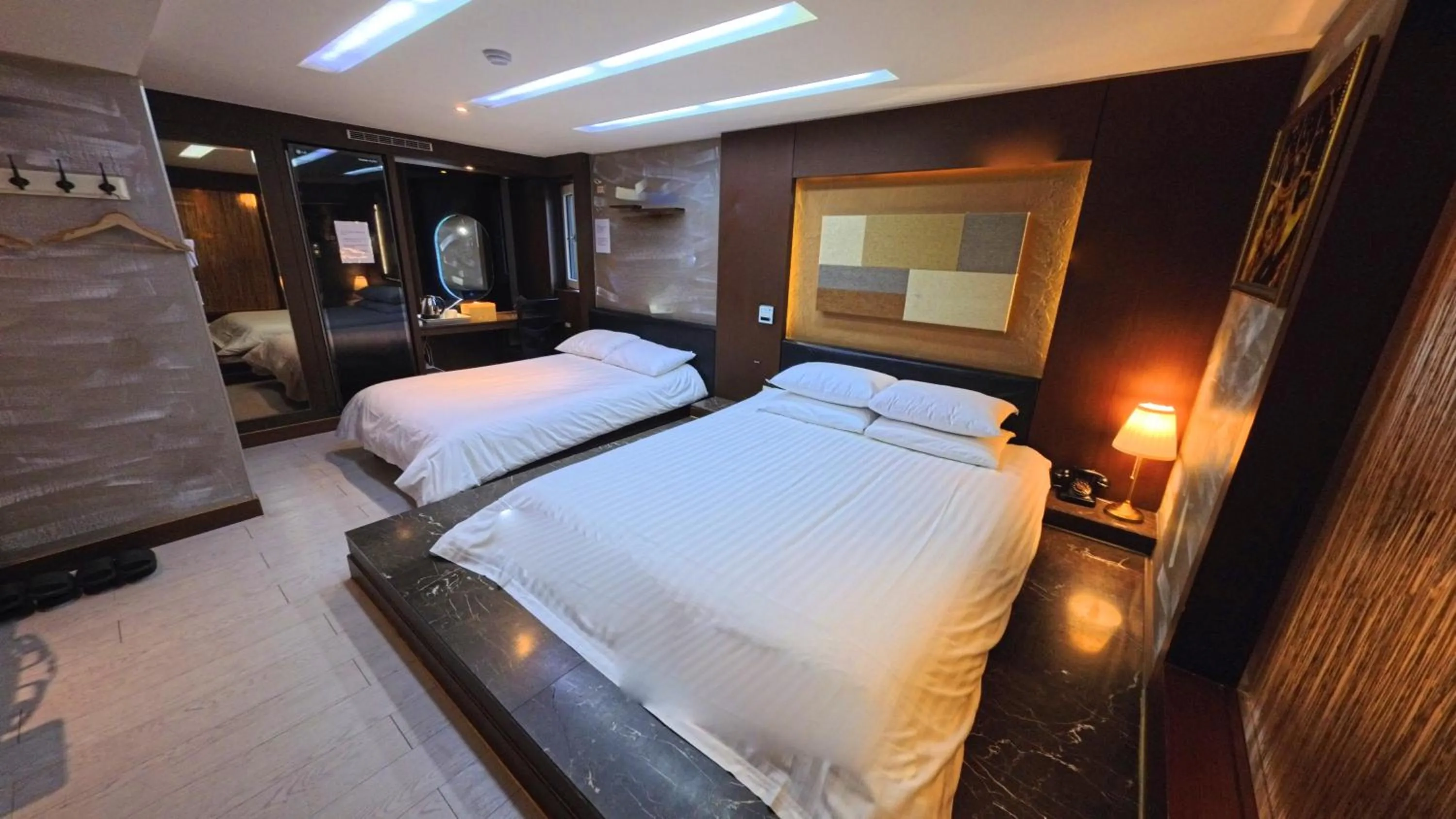 Bed in Friendly DH Naissance Hotel by Mindrum Group