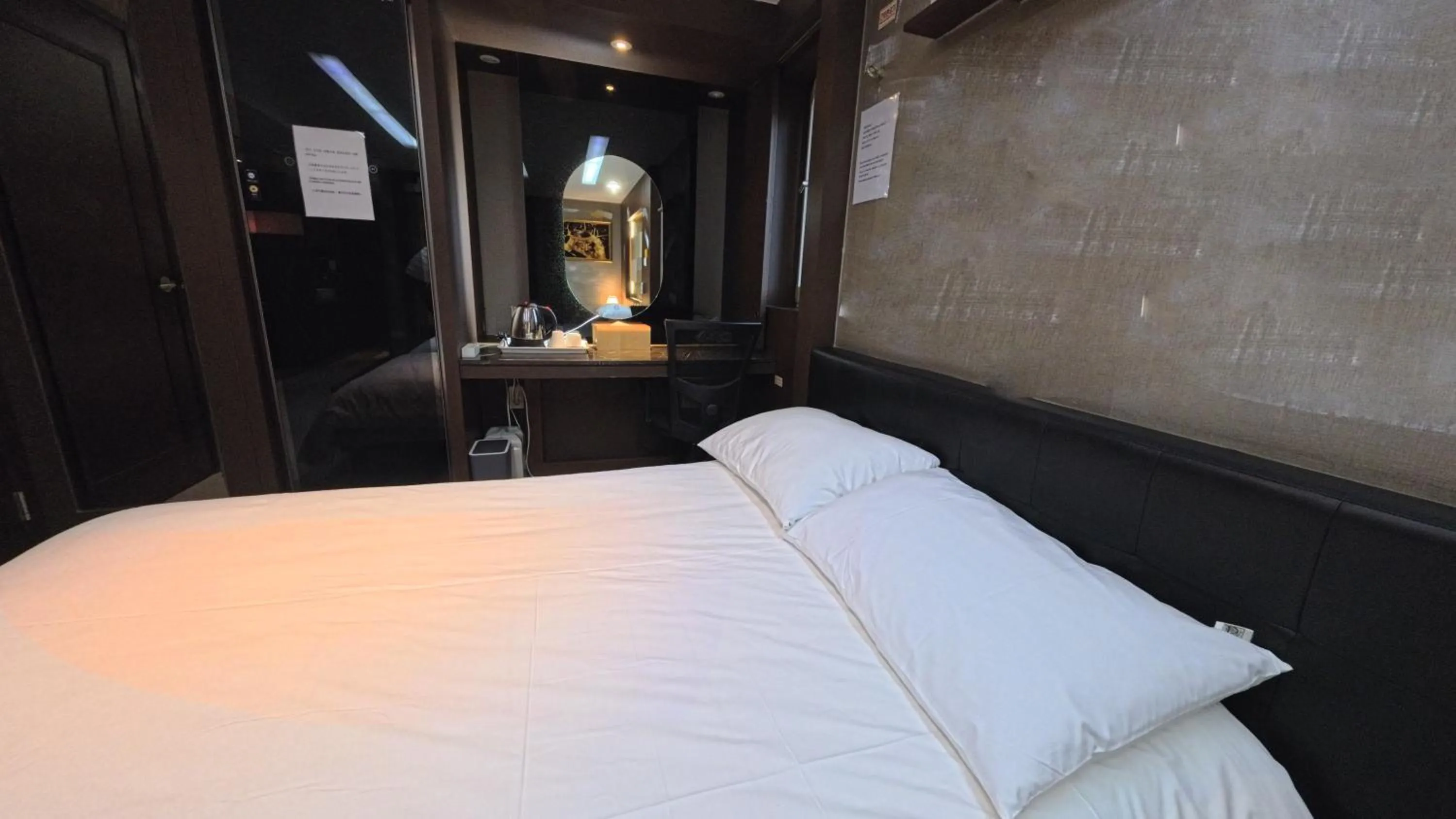 Bed in Friendly DH Naissance Hotel by Mindrum Group