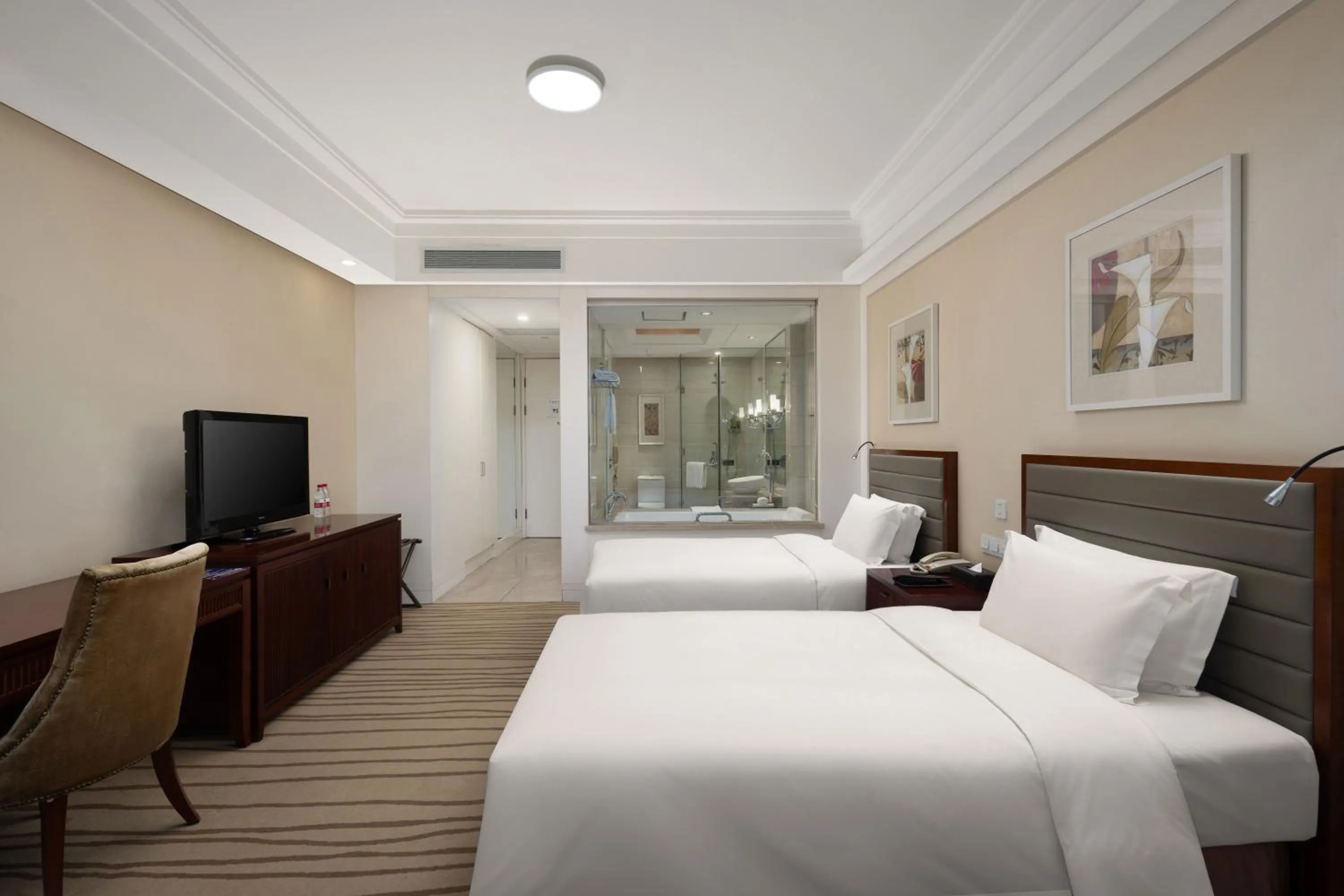 Bed in New Century Hotel Qingdao