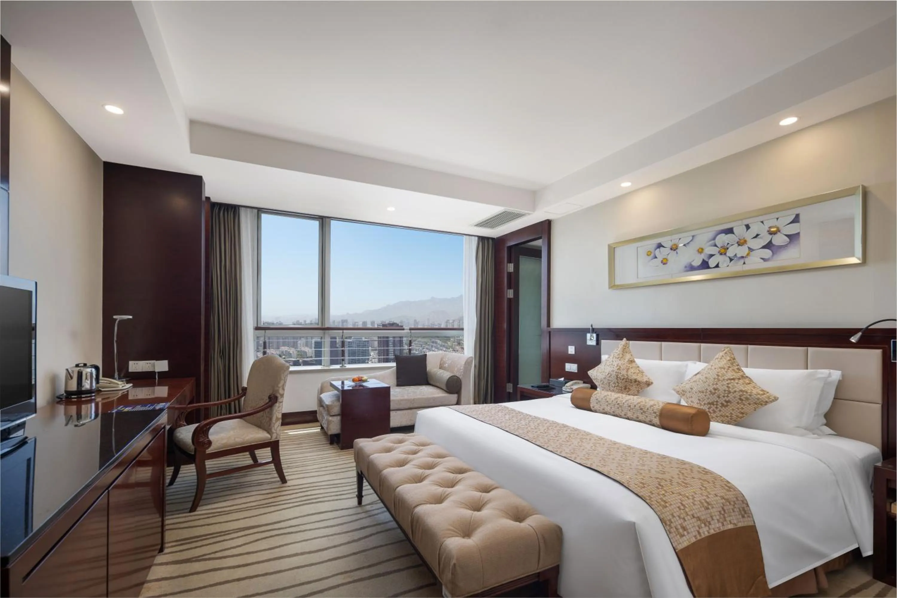 Bed in New Century Hotel Qingdao