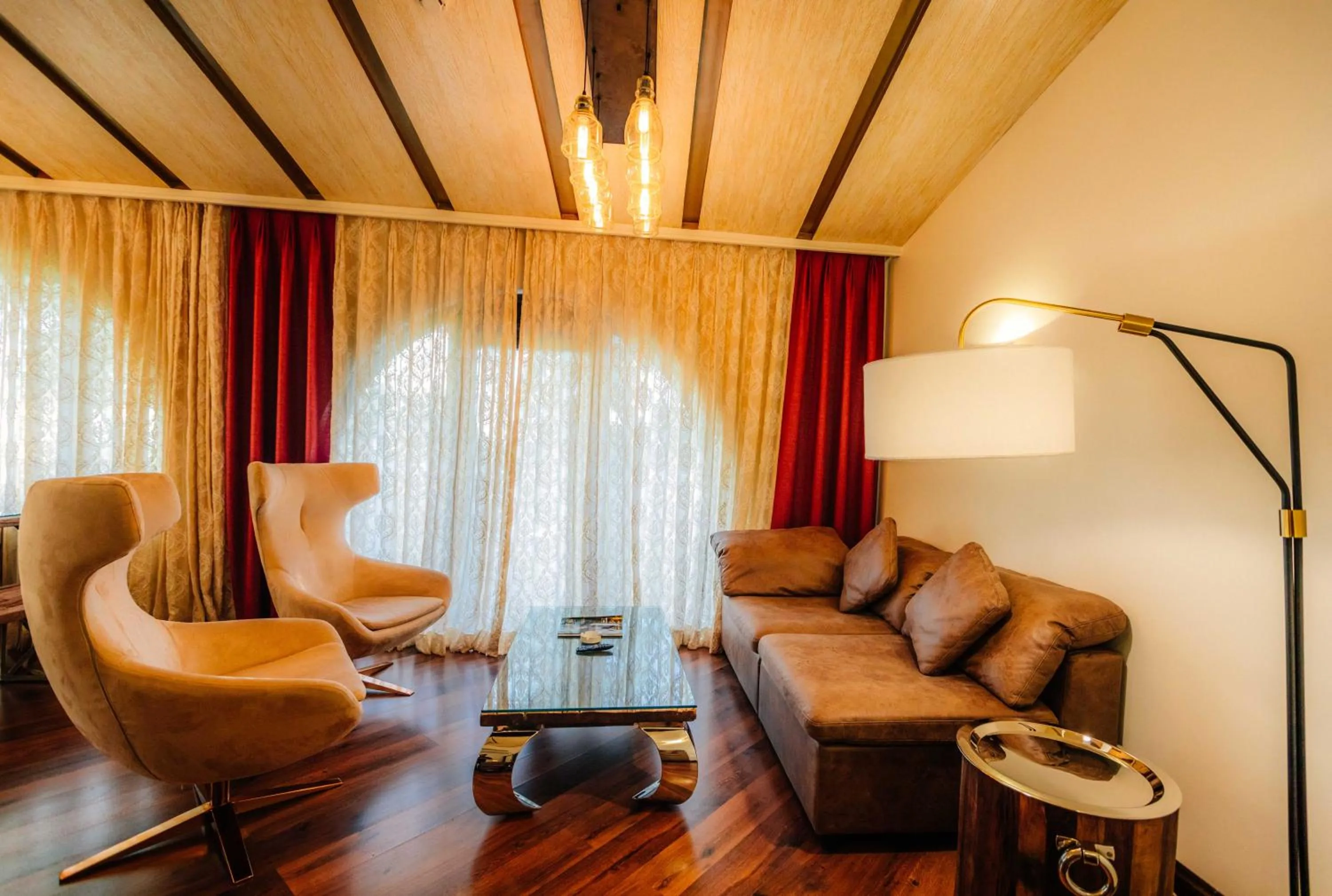 Living room in Holiday Inn Resort Goa by IHG