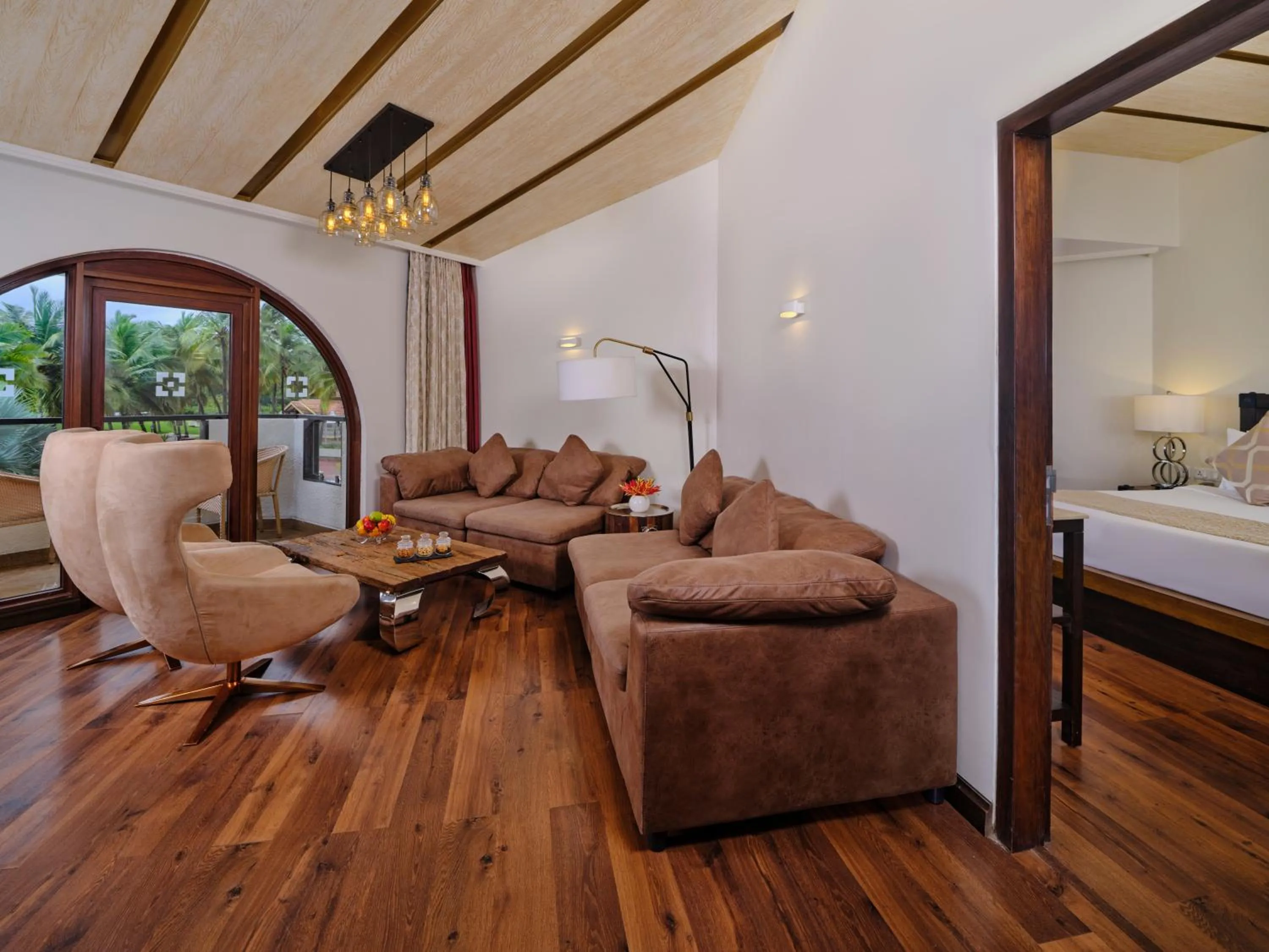 Seating area, Bed in Holiday Inn Resort Goa by IHG