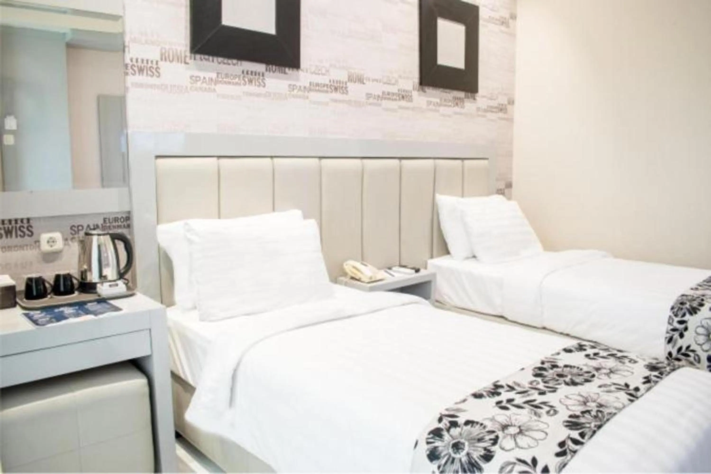 Bed in Luminor Hotel Jember By WH