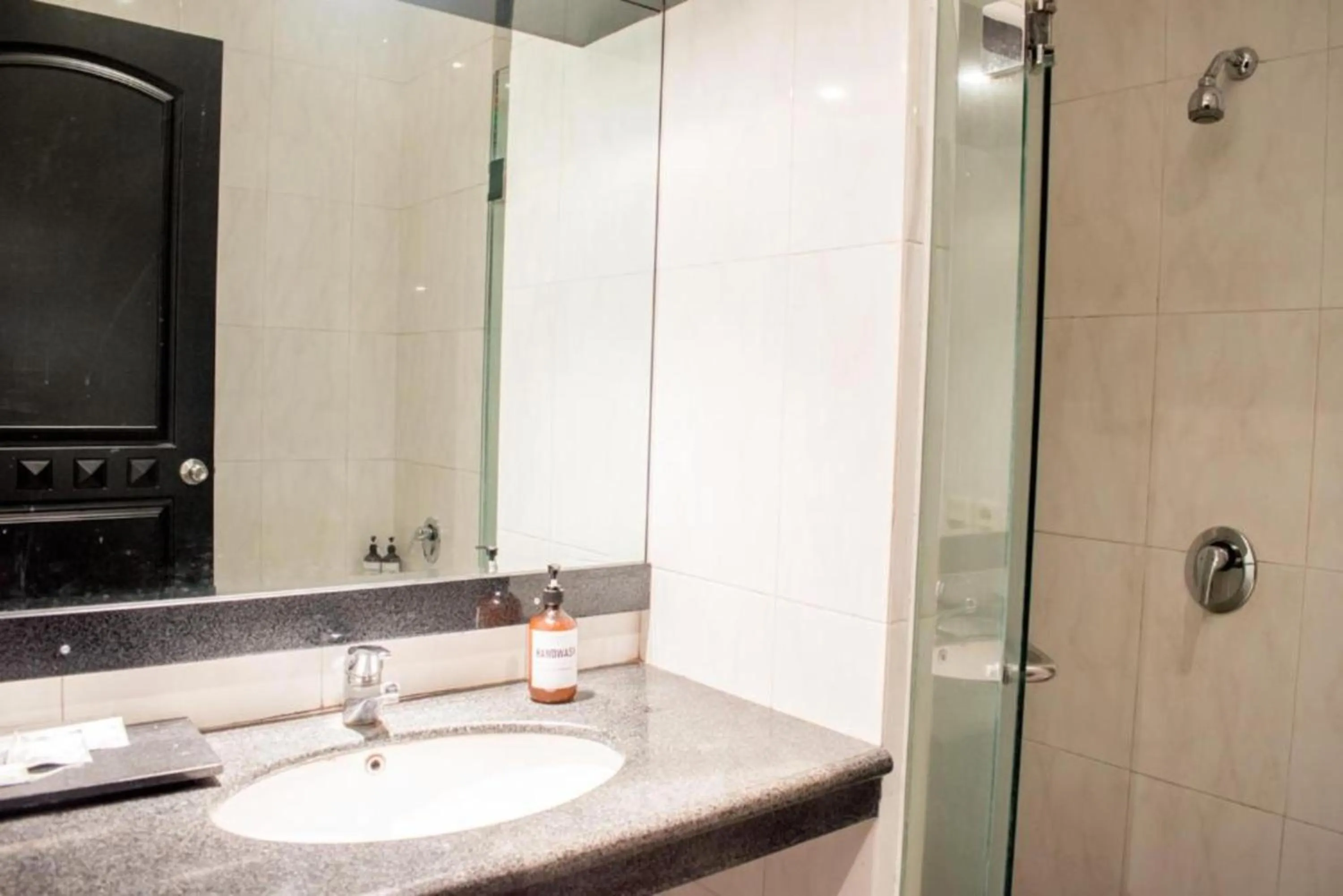 Bathroom in Luminor Hotel Jember By WH