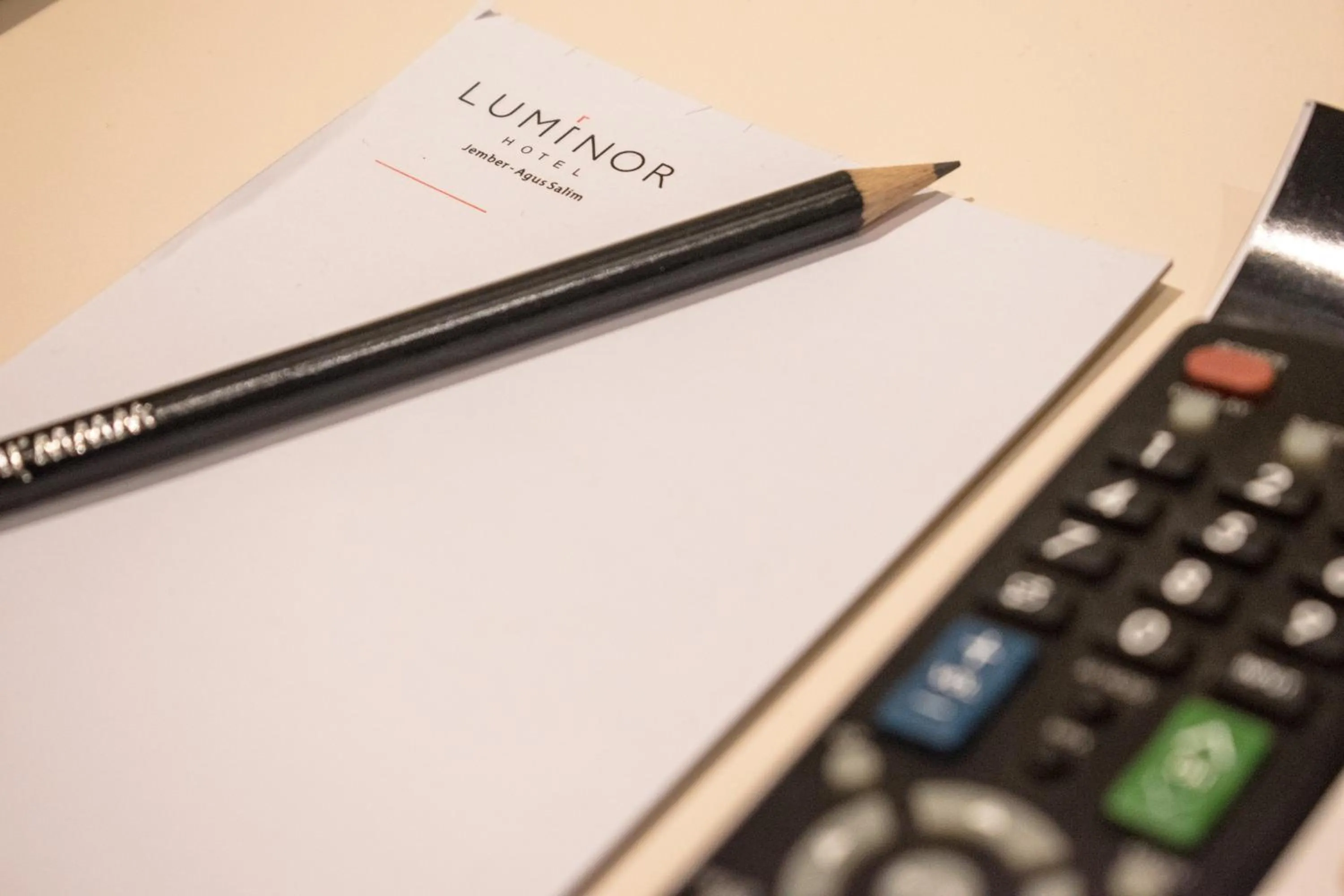 Logo/Certificate/Sign in Luminor Hotel Jember By WH