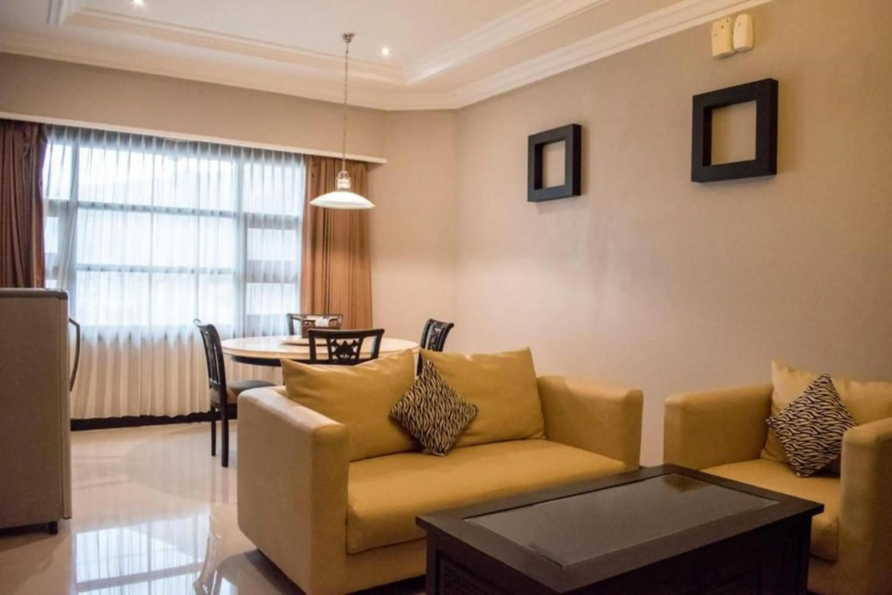 Living room in Luminor Hotel Jember By WH