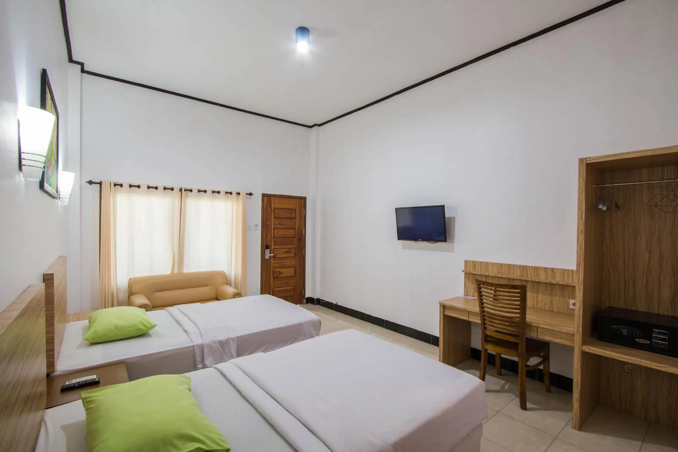 Bed in Central Inn Senggigi