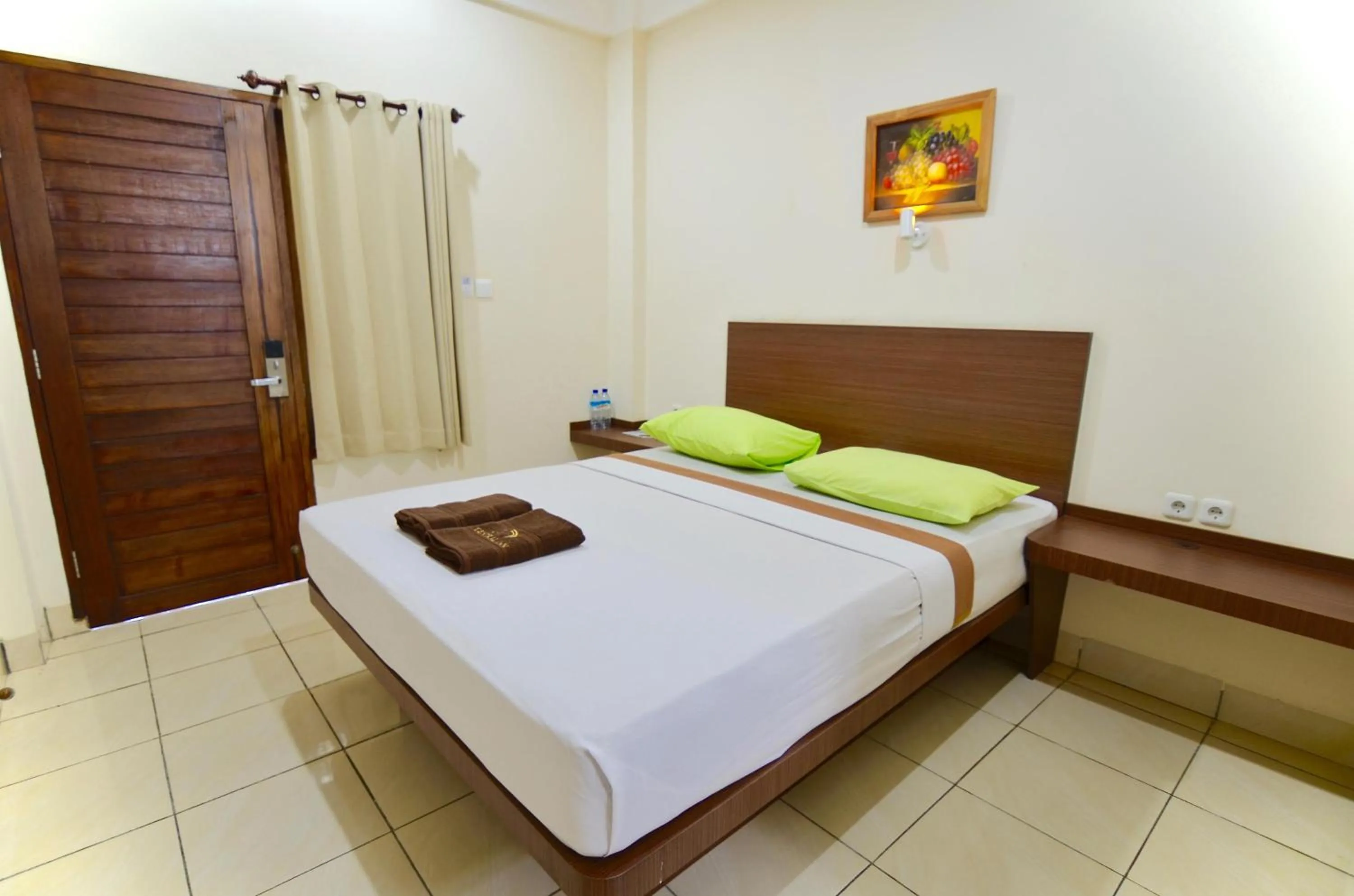 Bed in Central Inn Senggigi