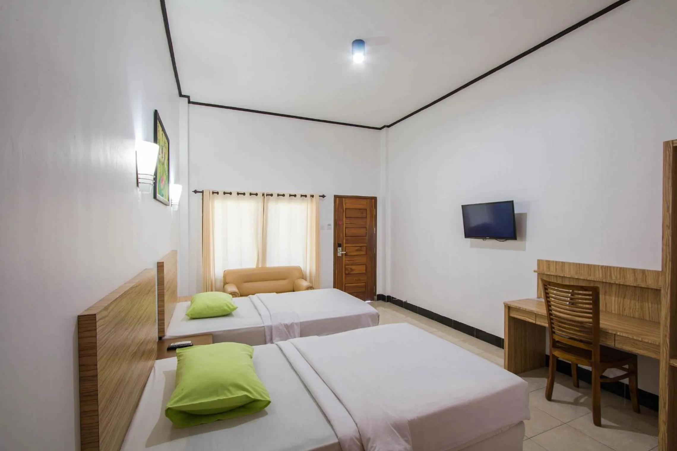 Bed in Central Inn Senggigi