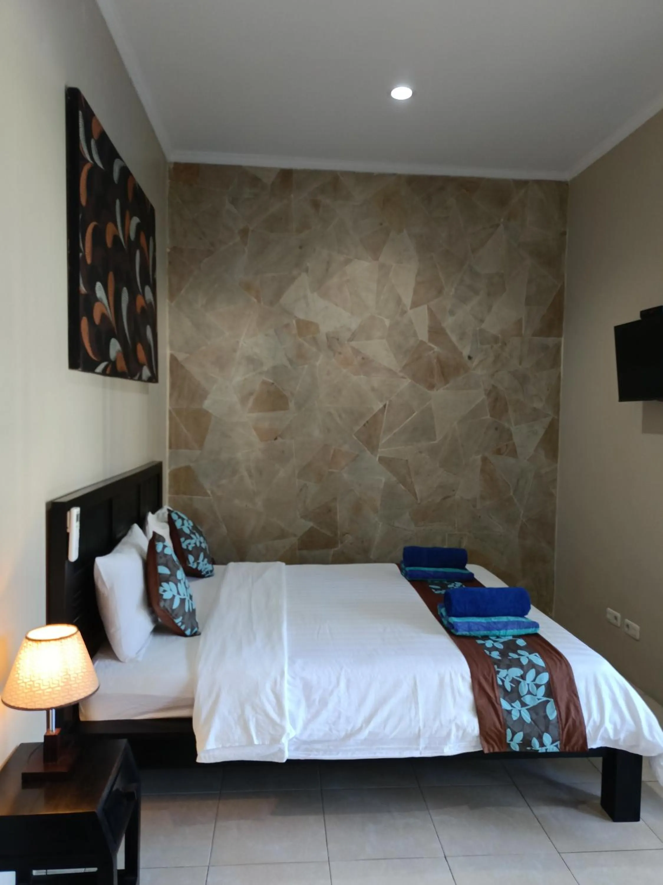 Bed in Gili Palms Resort