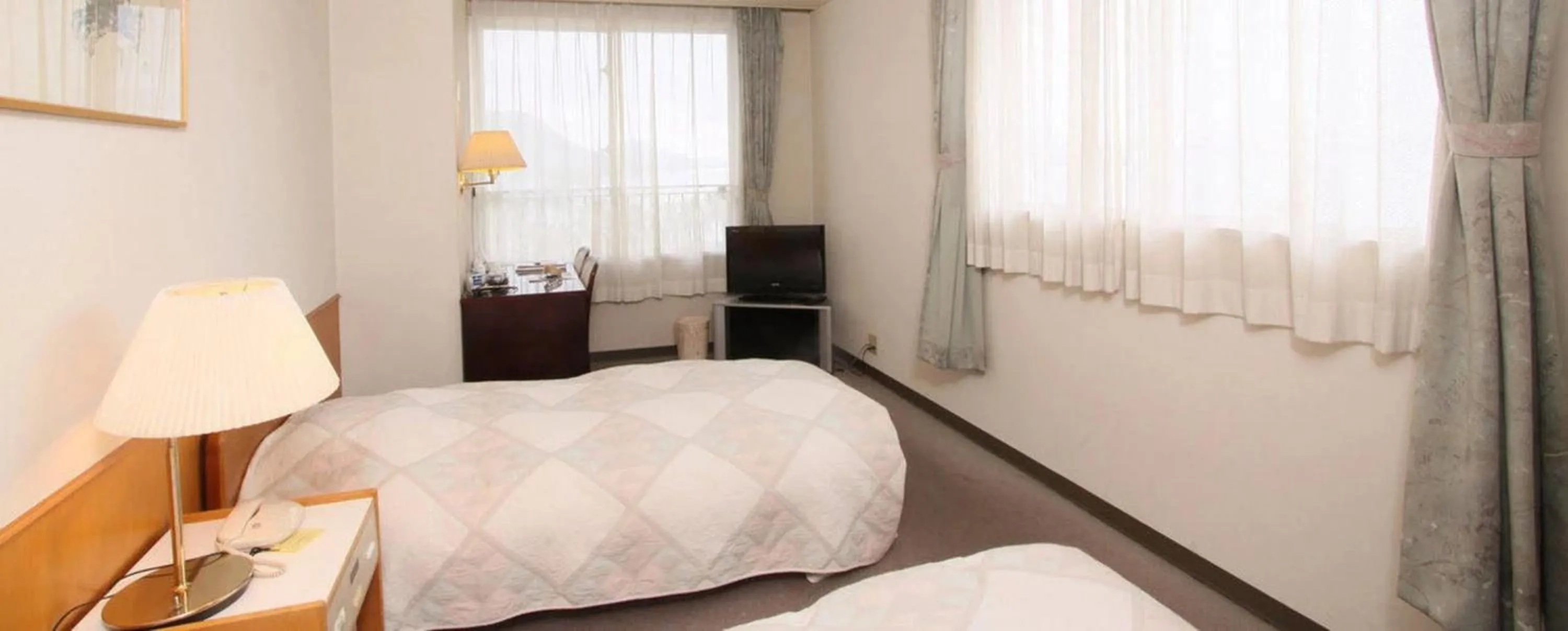 Bed in Kyukamura Ohkunoshima