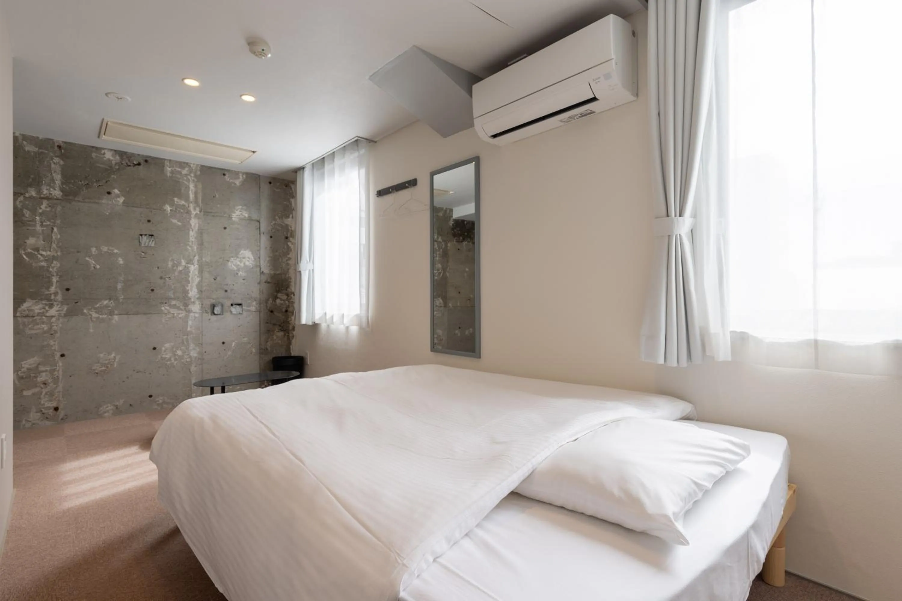 Photo of the whole room, Bed in Crasco TABI-NE