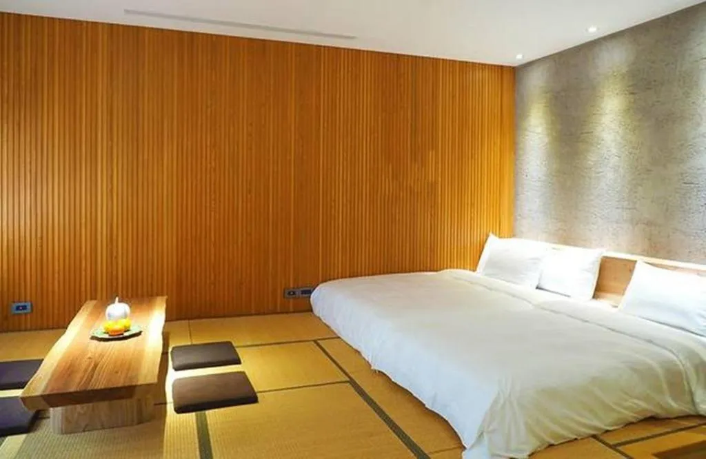 Bed in 小小邸 Small Hotel