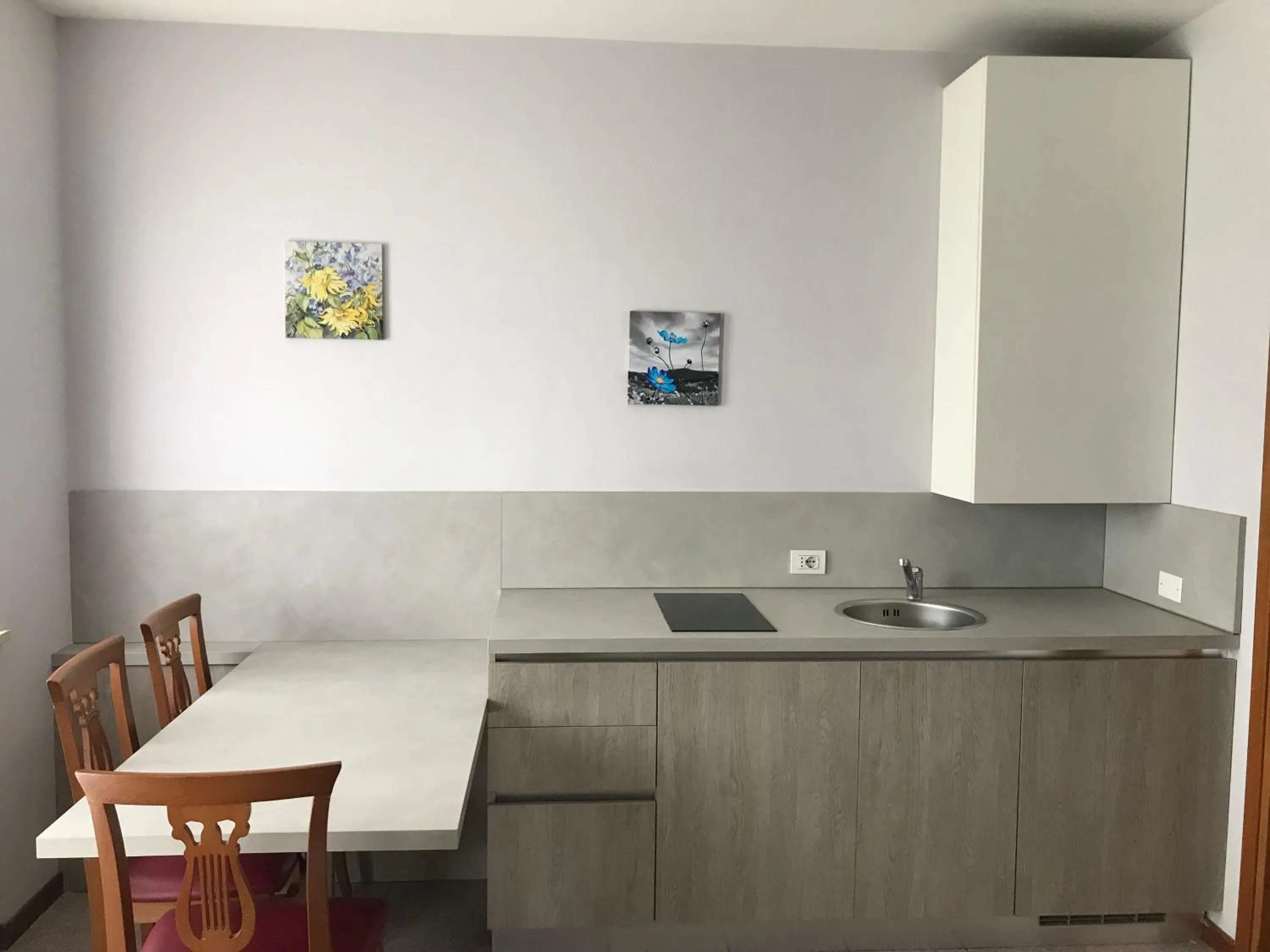 Kitchen or kitchenette in Camere Girasole