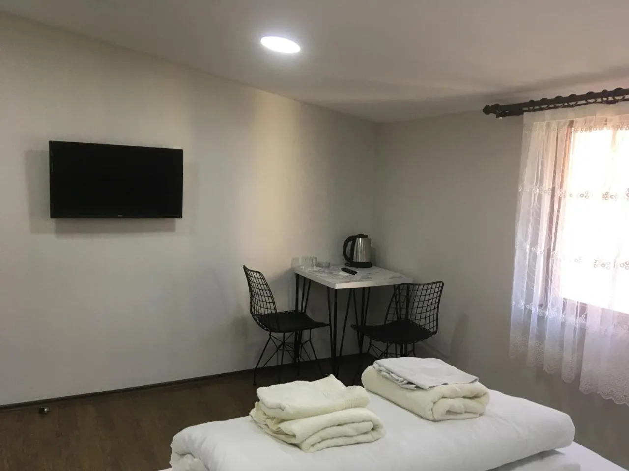 Communal lounge/ TV room, Bed in Kule Pansiyon