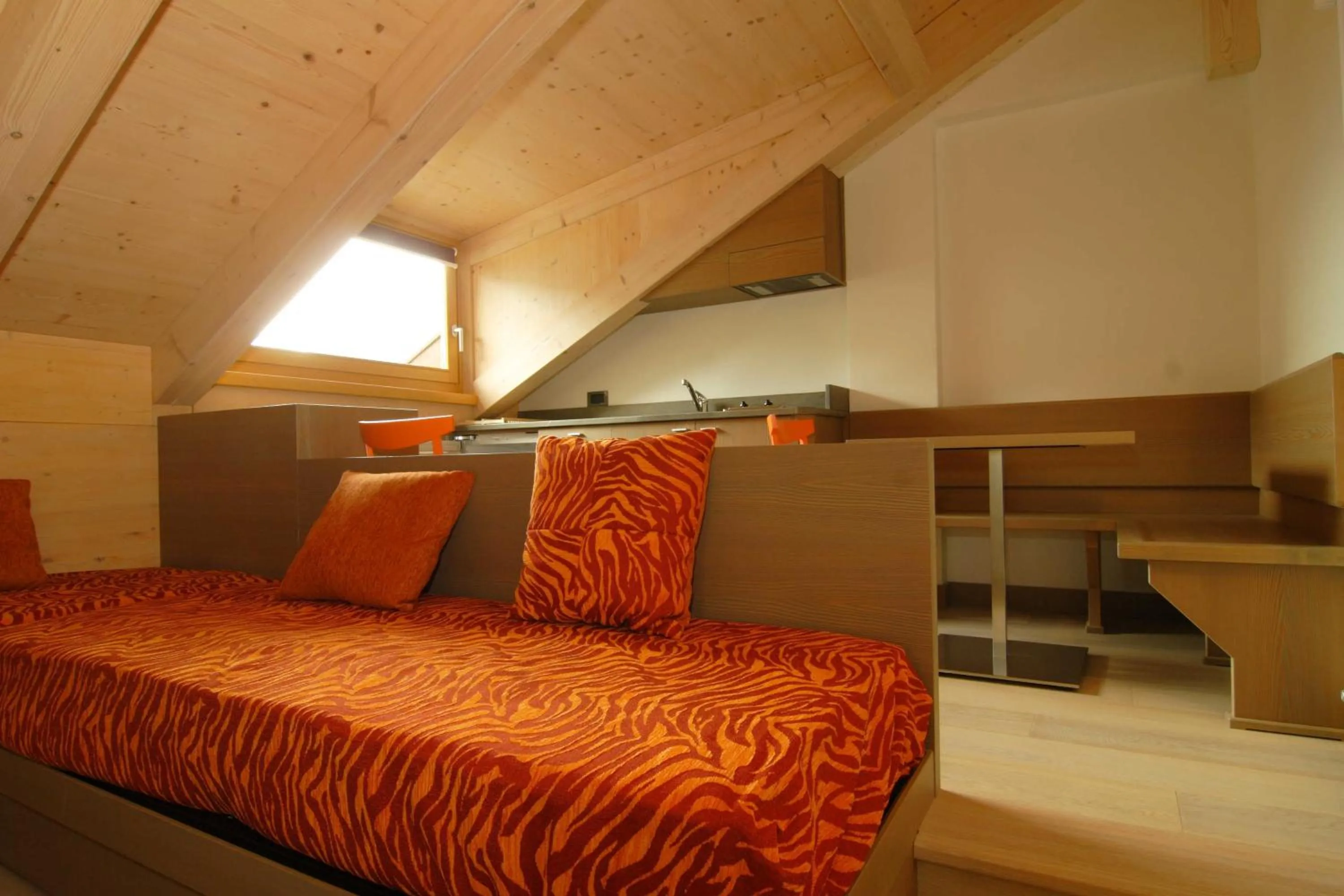 Seating area, Bed in Dolomiti Lodge Villa Gaia
