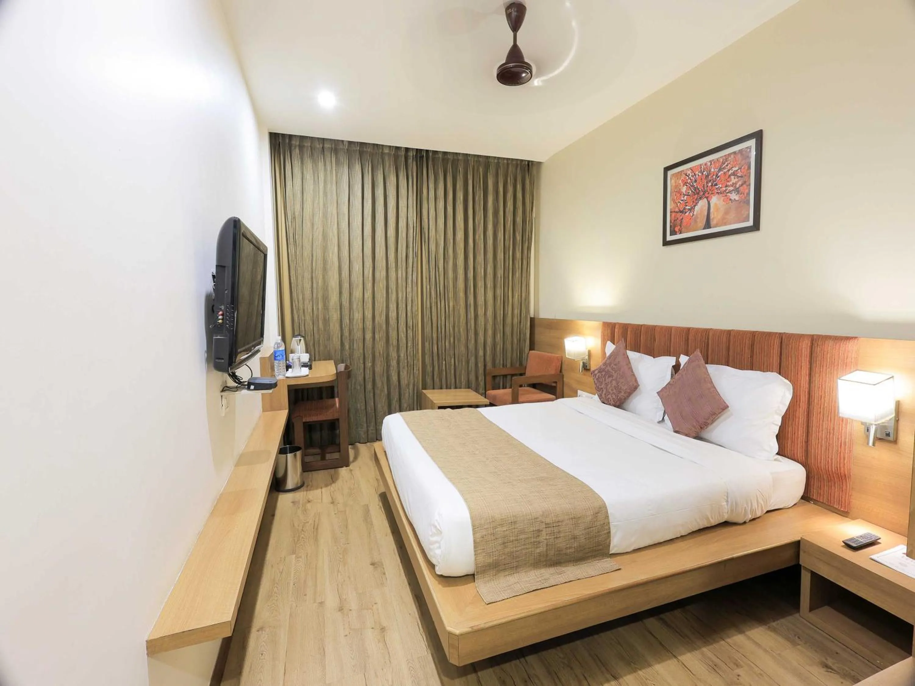 Deluxe Double or Twin Room - single occupancy in Palette Hotel Surya by CheckIn, Vadodara
