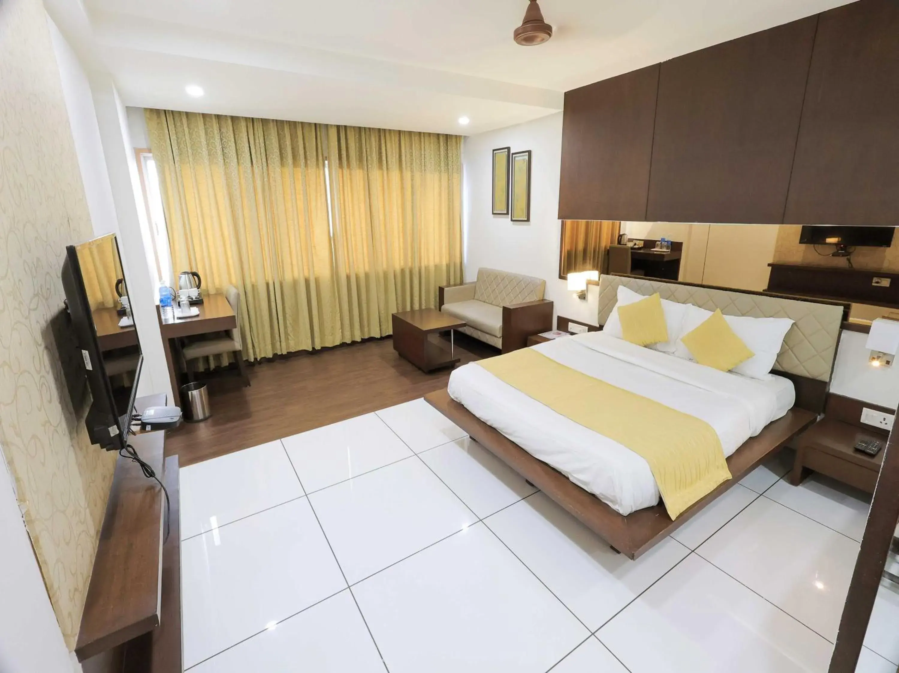 Deluxe Triple Room - single occupancy in Palette Hotel Surya by CheckIn, Vadodara Deluxe Triple Room - single occupancy in Palette Hotel Surya by CheckIn, Vadodara