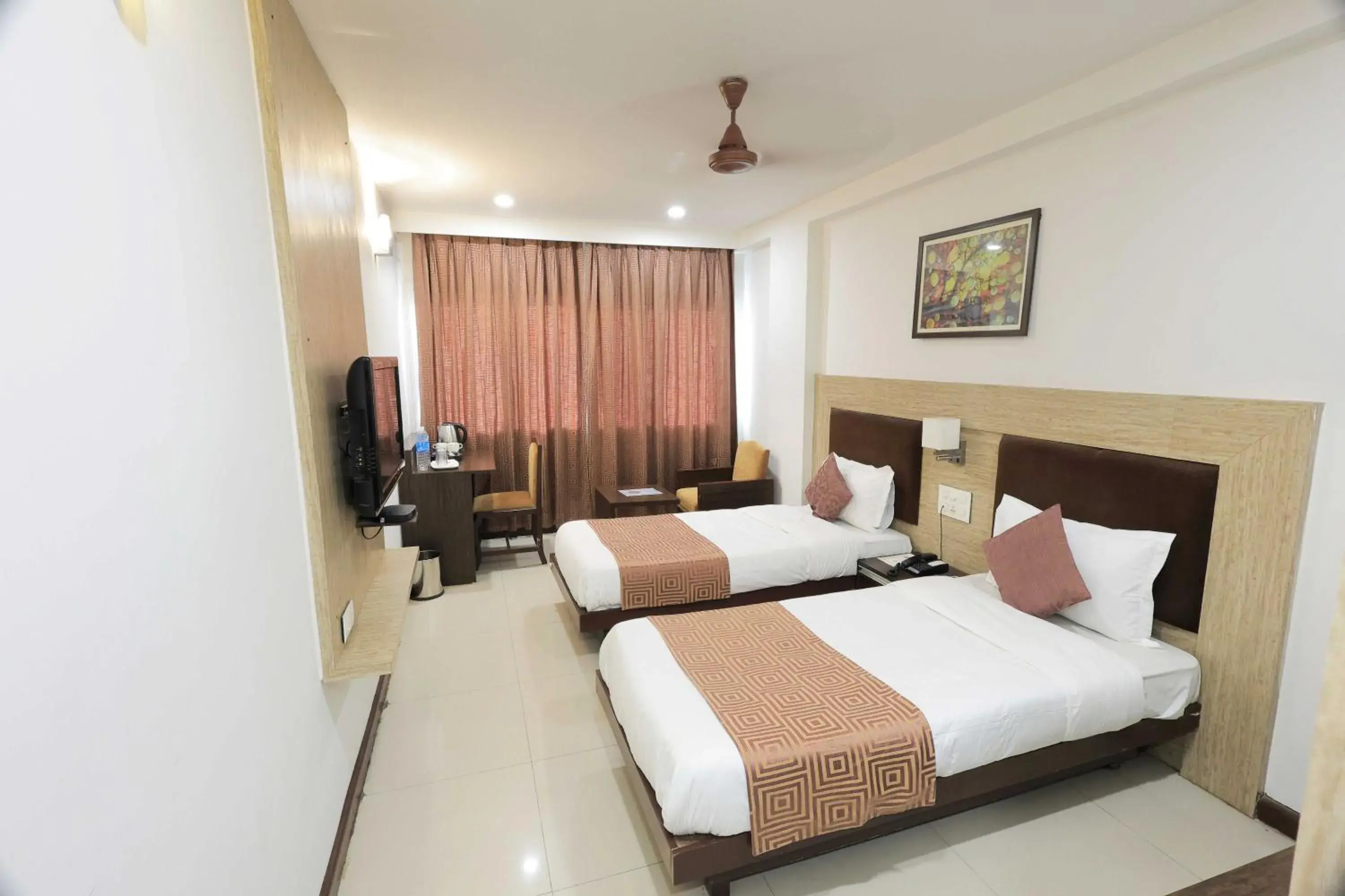 Classic Triple Room - single occupancy in Palette Hotel Surya by CheckIn, Vadodara Classic Triple Room - single occupancy in Palette Hotel Surya by CheckIn, Vadodara