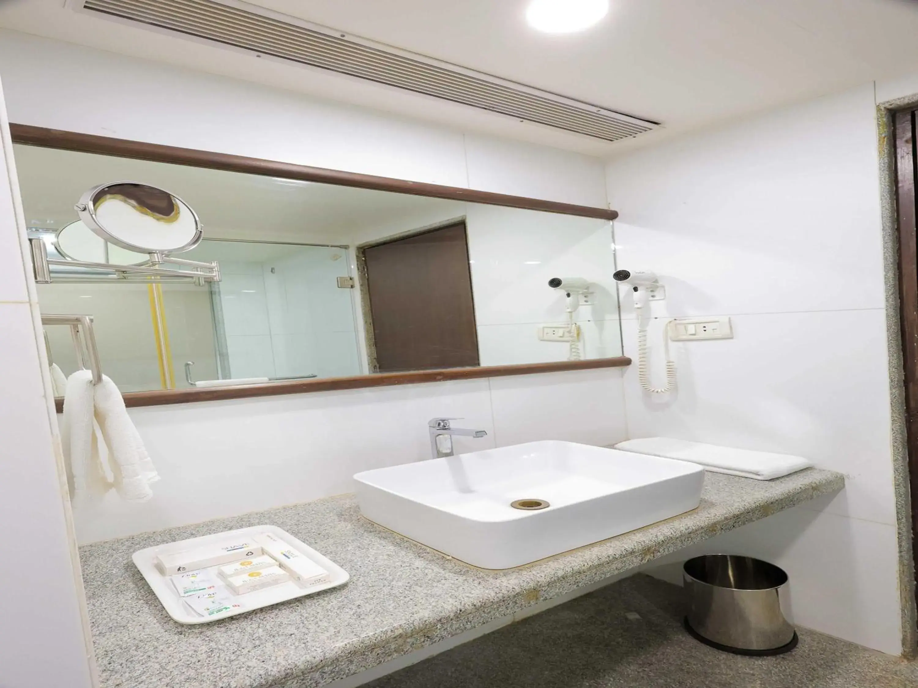 Luxury Triple Room - single occupancy in Palette Hotel Surya by CheckIn, Vadodara Luxury Triple Room - single occupancy in Palette Hotel Surya by CheckIn, Vadodara