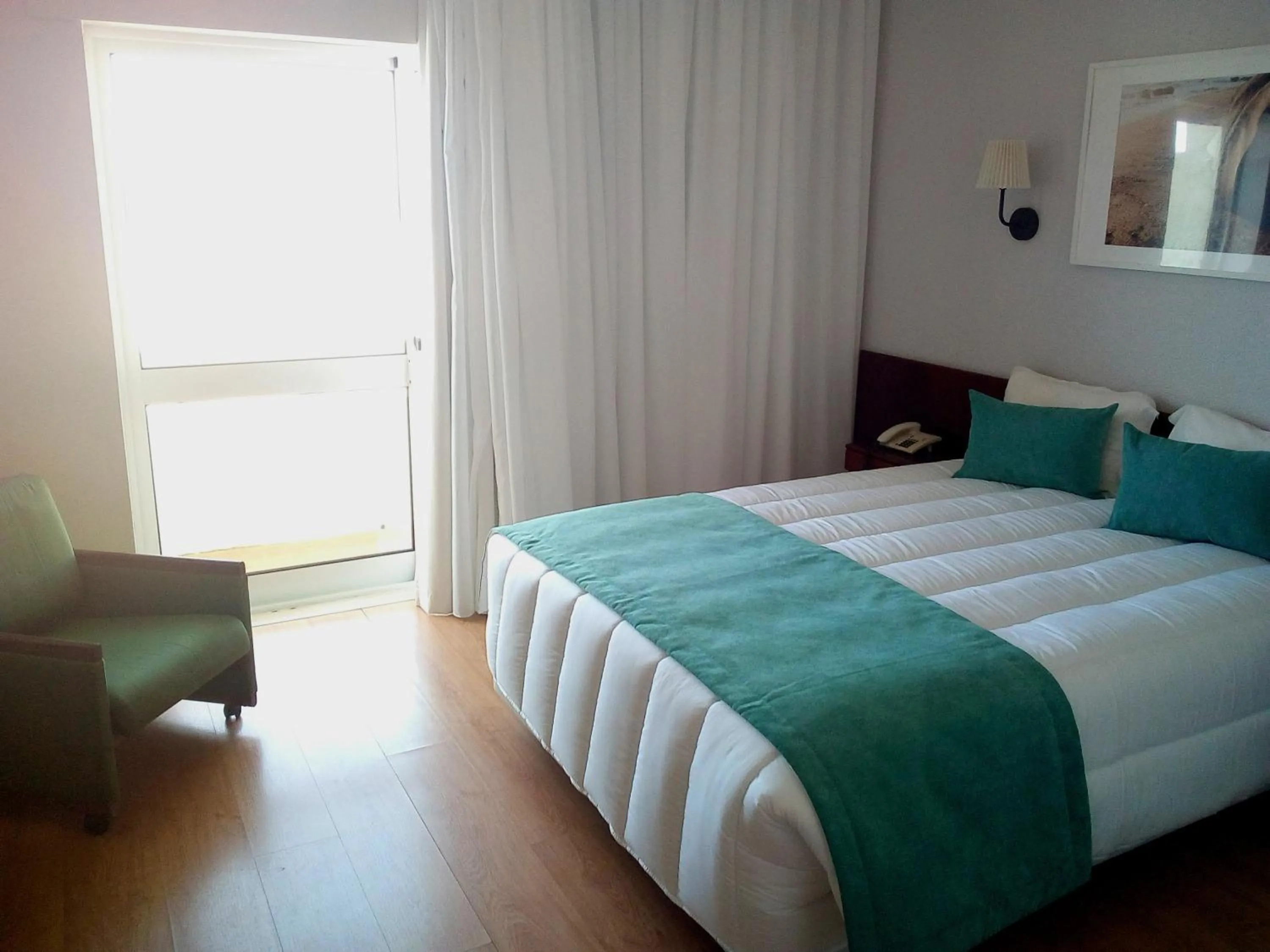 Photo of the whole room, Bed in Hotel Costa de Prata 2 & Spa